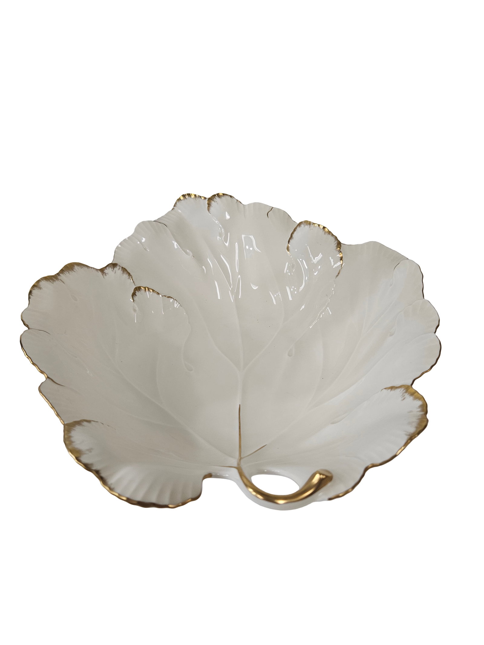 Mikasa Larry Laslo Gold Trim Leaf Bowl: This large ivory bone china serving bowl features a detailed figural leaf design with a curved stem handle. It is accented with elegant 24 karat gold trim along the scalloped edges and central leaf ve