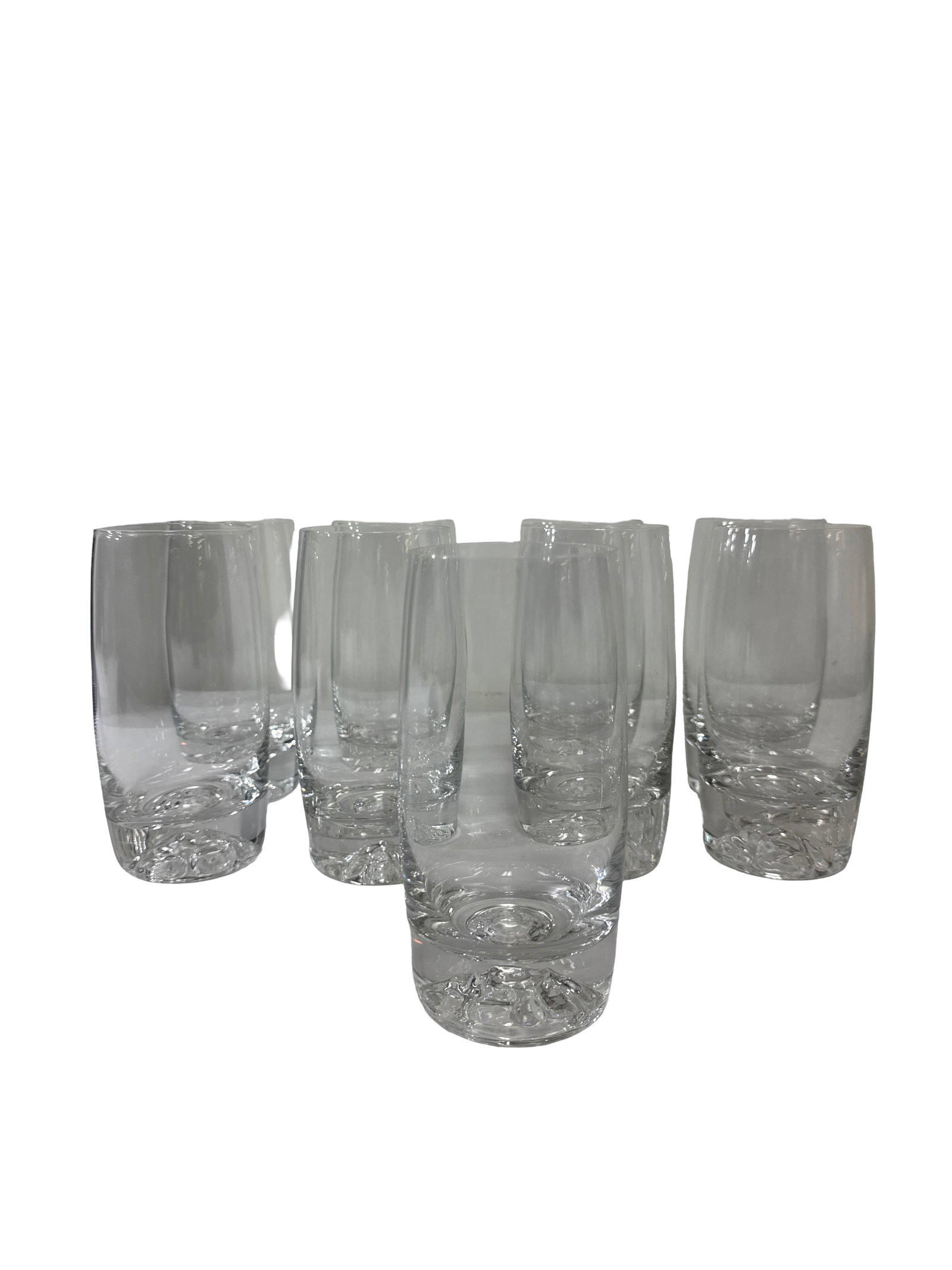 Set of 9 Textured Heavy Base Tumblers: This set includes nine contemporary glass highball tumblers featuring a heavy, thick base with a decorative textured bubble or ice-like pattern. Each glass is crafted from clear glass with a sleek, sl