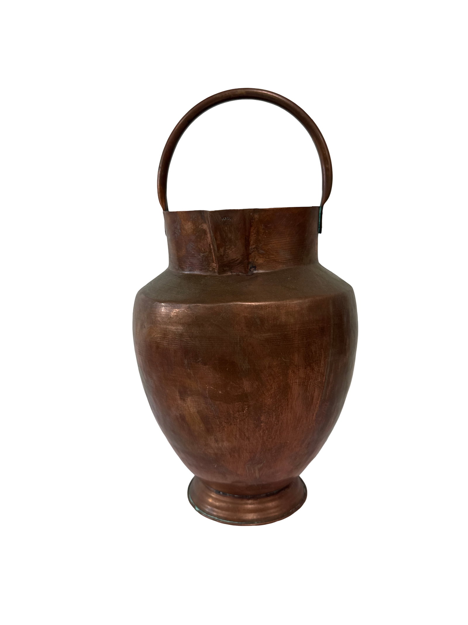 Vintage Hand-Hammered Copper Spouted Jug: This vintage hand-hammered copper vessel features a bulbous body, a tapered neck, and a fixed overhead swing handle. The piece is designed with a small integrated spout and sits on a circular pedestal