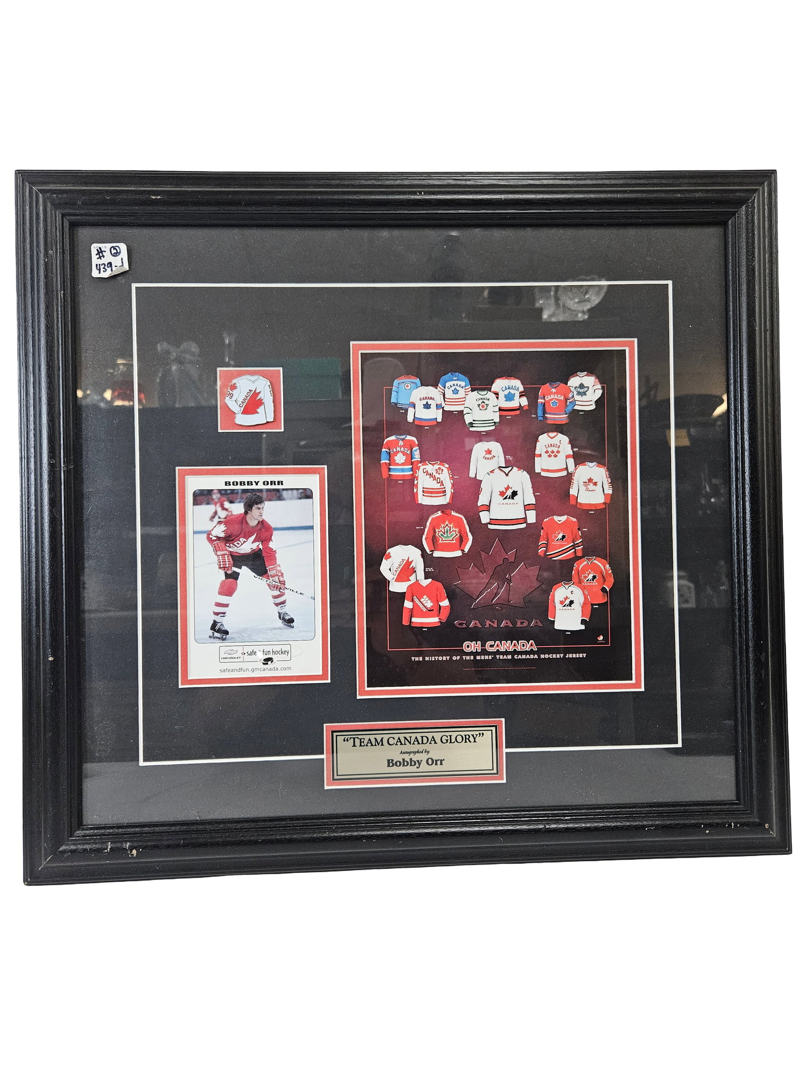 Team Canada Glory Framed Bobby Orr Set: This framed collage titled 'Team Canada Glory' celebrates the history of Team Canada hockey, featuring a Bobby Orr trading card and a 'History of the Mens Team Canada Hockey Jersey' poster. The displa