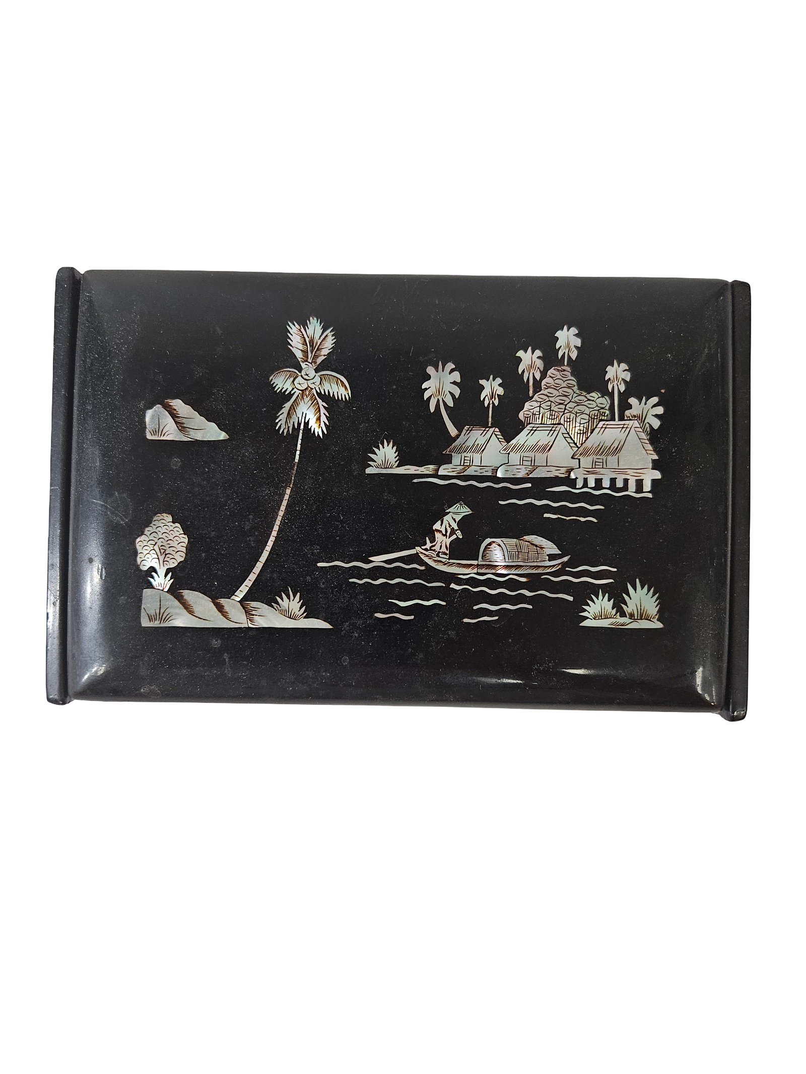 Asian Lacquer Mother of Pearl Inlay Box: This mid-century Asian lacquer box features a detailed mother of pearl inlay depicting a tropical coastal scene with palm trees and stilt houses. A figure in a traditional sampan boat navigates the wa