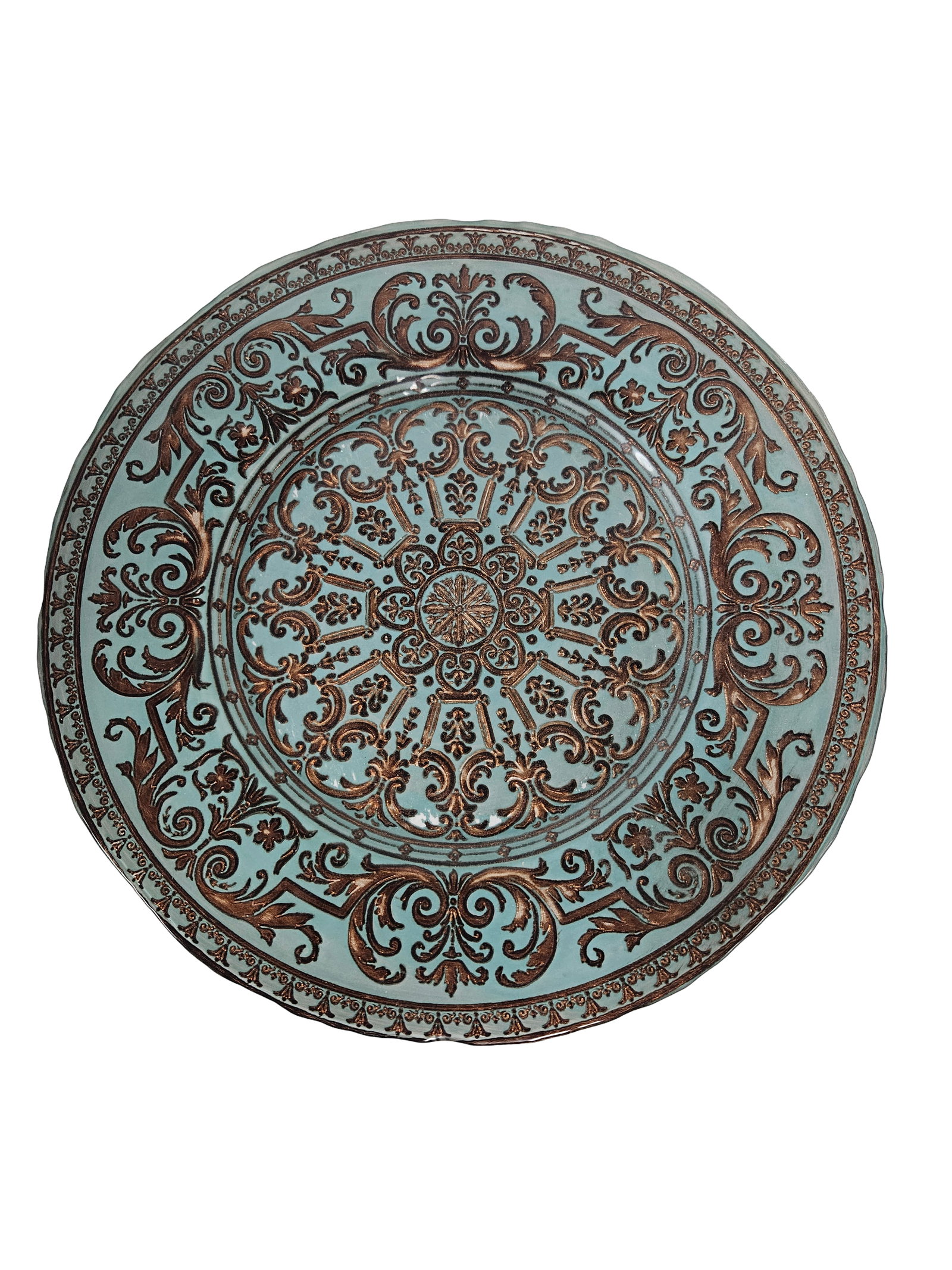 Large Blue & Bronze Scrollwork Charger: This decorative charger plate features a vibrant light blue ground accented by an intricate raised bronze-tone scrollwork and medallion design. The large-scale circular plate displays a mix of