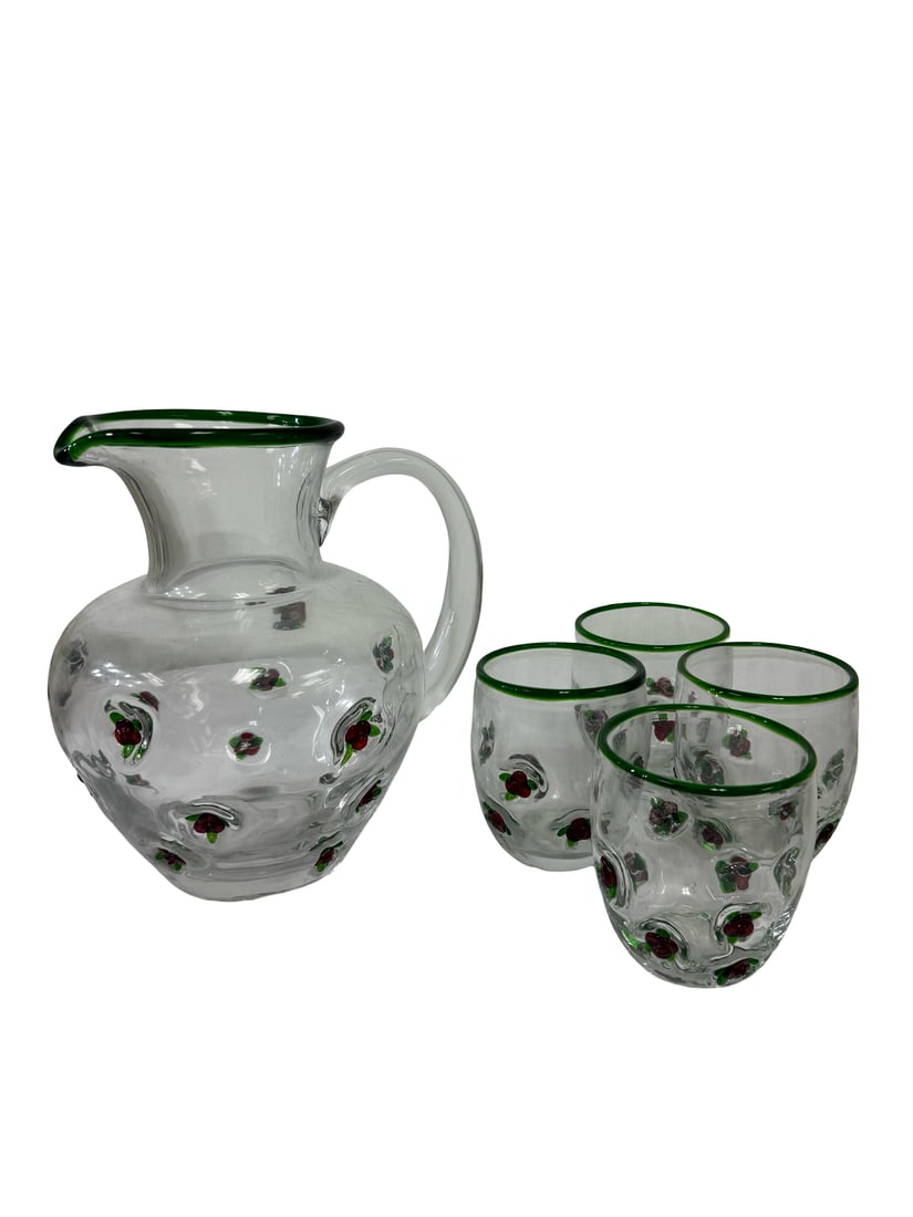 Applied Raspberry Glass Pitcher & Cups: This five-piece hand-blown glass beverage set features a rounded pitcher and four matching tumblers. Each piece is decorated with applied glass raspberries and leaves, finished with a vibrant green