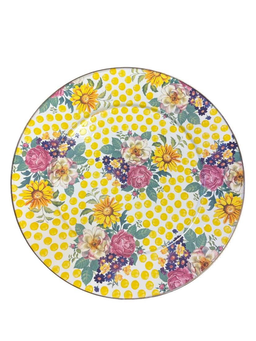 MacKenzie-Childs Floral Platter: This large circular enamel charger platter is attributed to MacKenzie-Childs and features a vibrant floral and yellow polka dot pattern. The design showcases colorful bouquets of roses and sunflowers 