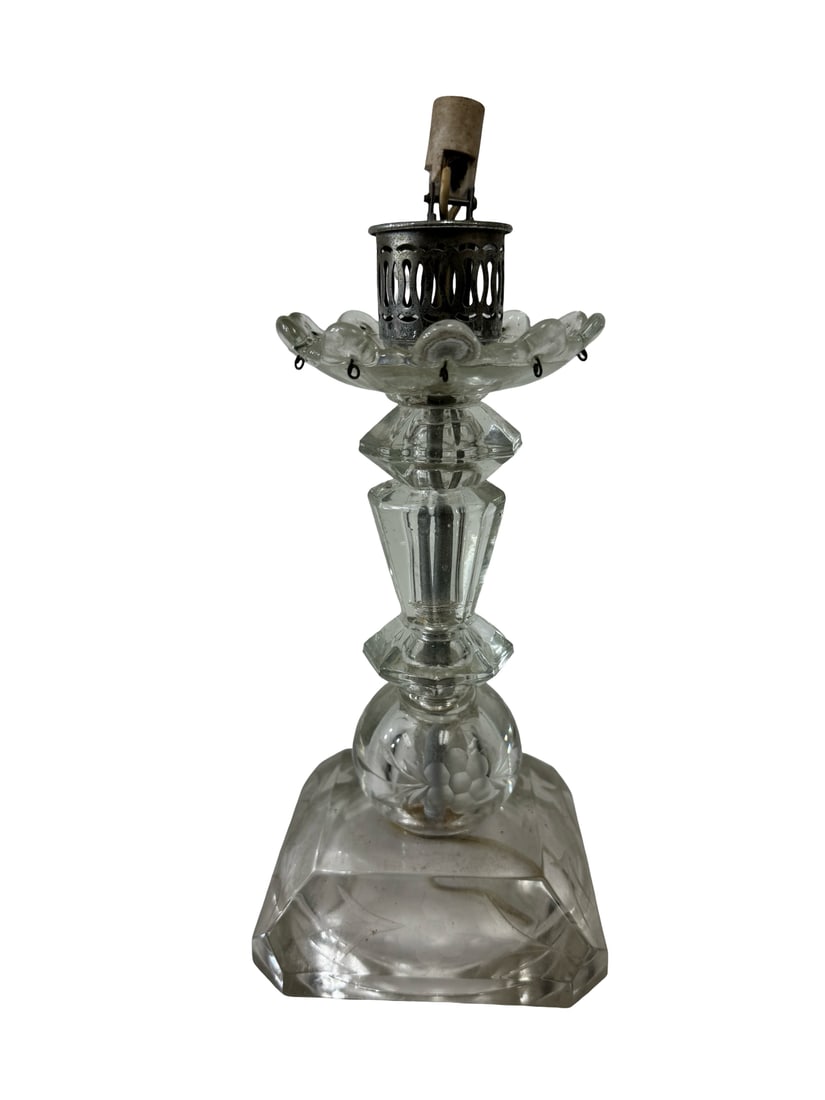Vintage Etched Glass Table Lamp Base: This vintage table lamp features a multi-tiered glass stem with a cut floral motif on the rounded base section. The square base displays frosted etched floral details along the beveled edges. A scallo