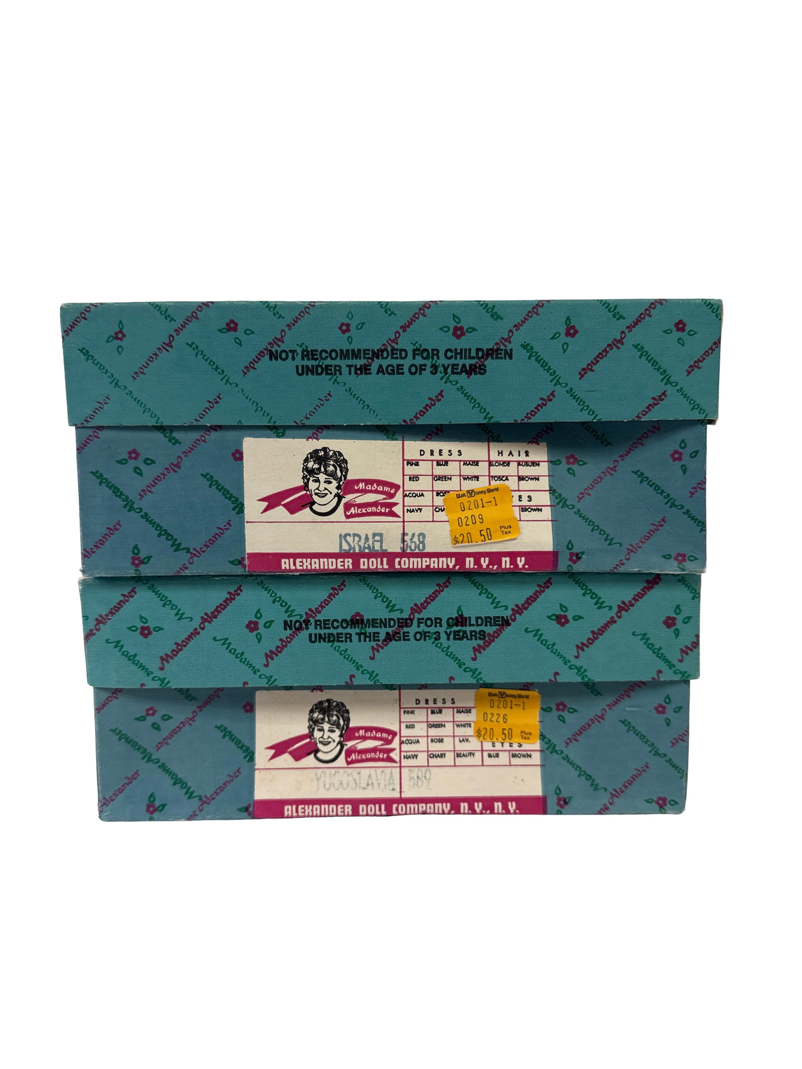 2 Madame Alexander International Dolls: This pair of Madame Alexander collectible dolls includes the 'Israel' and 'Yugoslavia' models from the International Collection. Both dolls come in their original branded boxes and feature