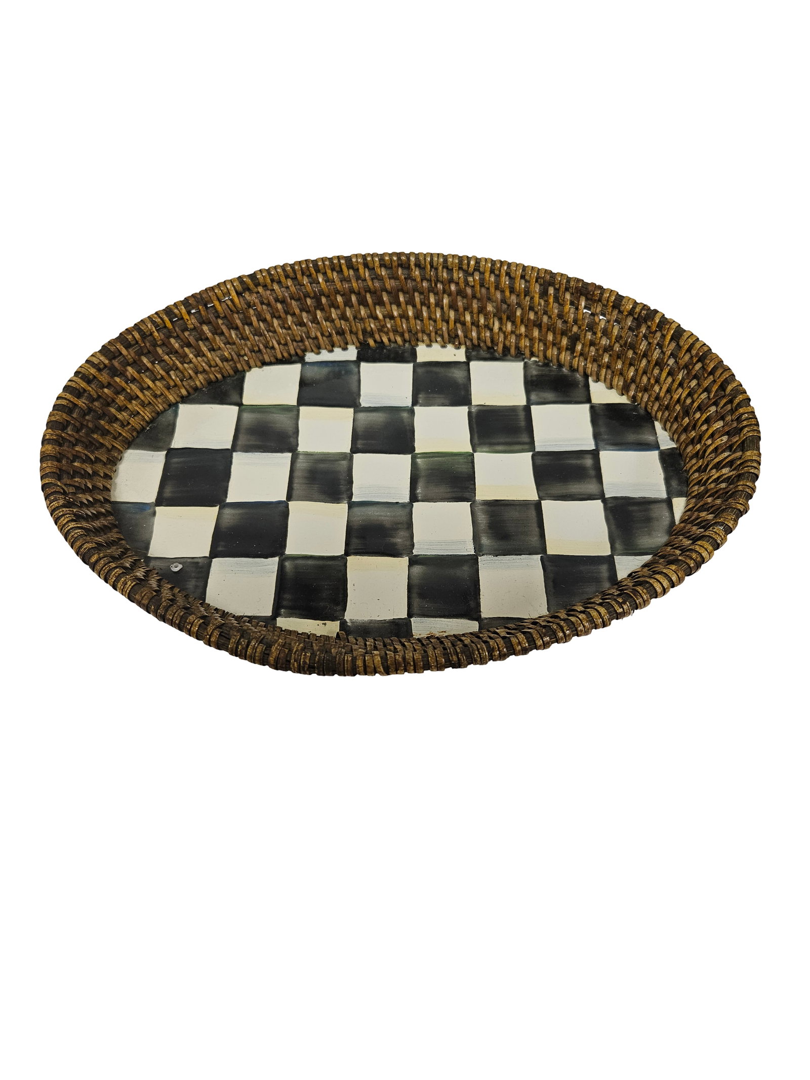 MacKenzie-Childs Courtly Check Tray: This oval serving tray features the signature black and white Courtly Check pattern in a hand-painted style. The piece is finished with a rustic woven rattan gallery rim for a textured, mixed-material
