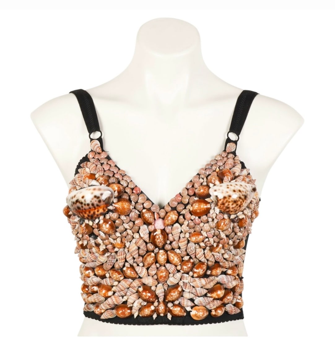 Angela Giovanna Grimoldi Shell Top: This unique vintage crop top features an elaborate shell-encrusted front panel in shades of brown, tan, and cream. The interior is hand-marked 'Angela Giovanna Grimoldi Italia', suggesting a custom