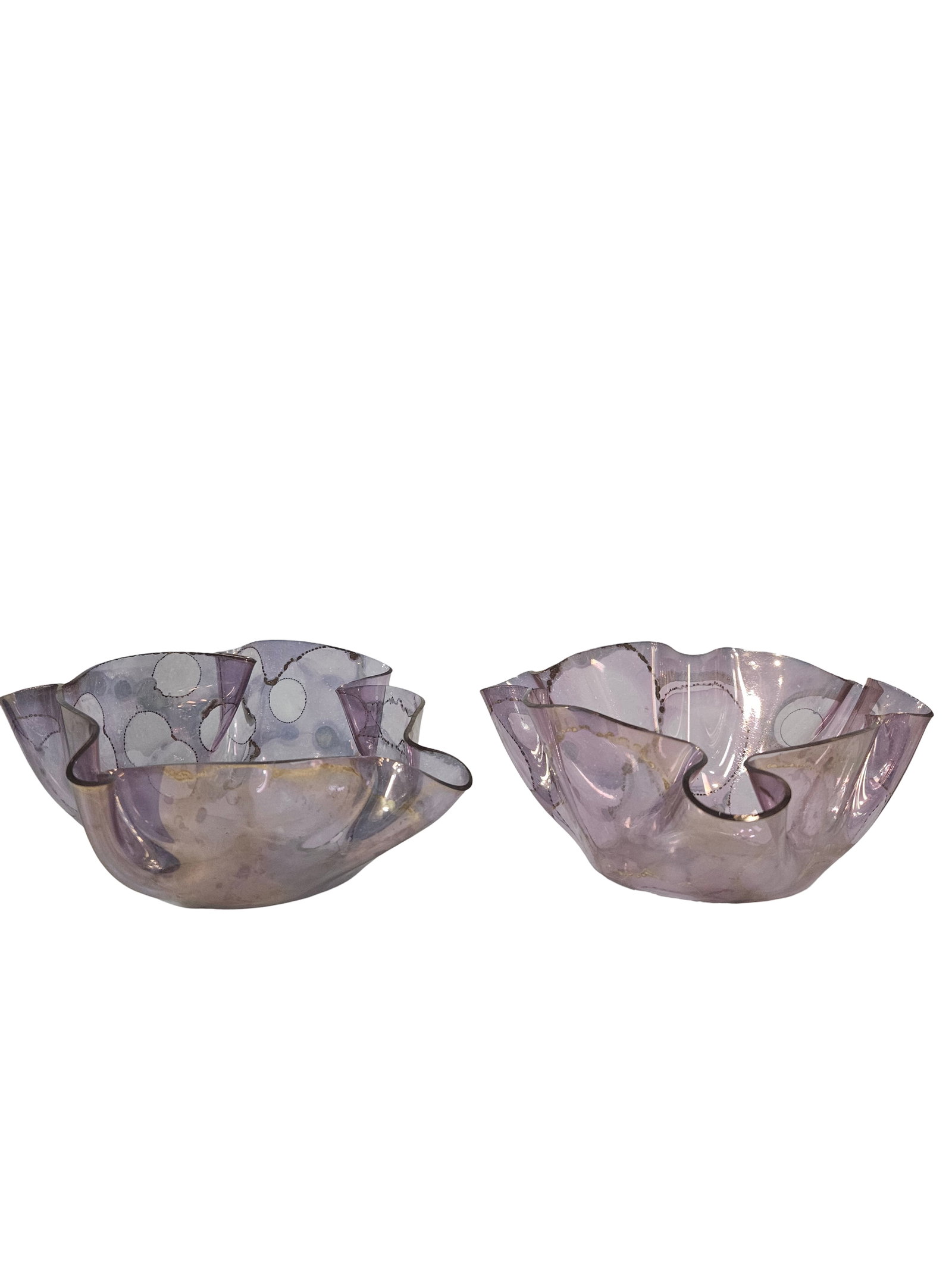 Pair of Iridescent Handkerchief Bowls: This pair of contemporary art glass bowls features a striking wavy handkerchief rim and a soft lavender-purple hue. Each bowl is decorated with a unique iridescent bubble or circle pattern outlined in