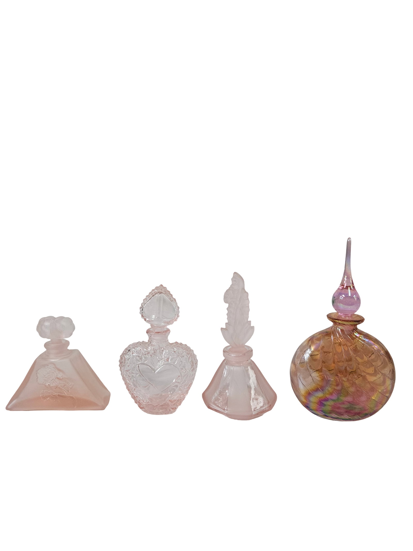 Vintage Collection of 4 Pink Glass Perfume: This charming vintage collection features four distinct pink glass perfume bottles including one large iridescent swirl vessel with a tall finial stopper. The set includes two frosted glass bottles