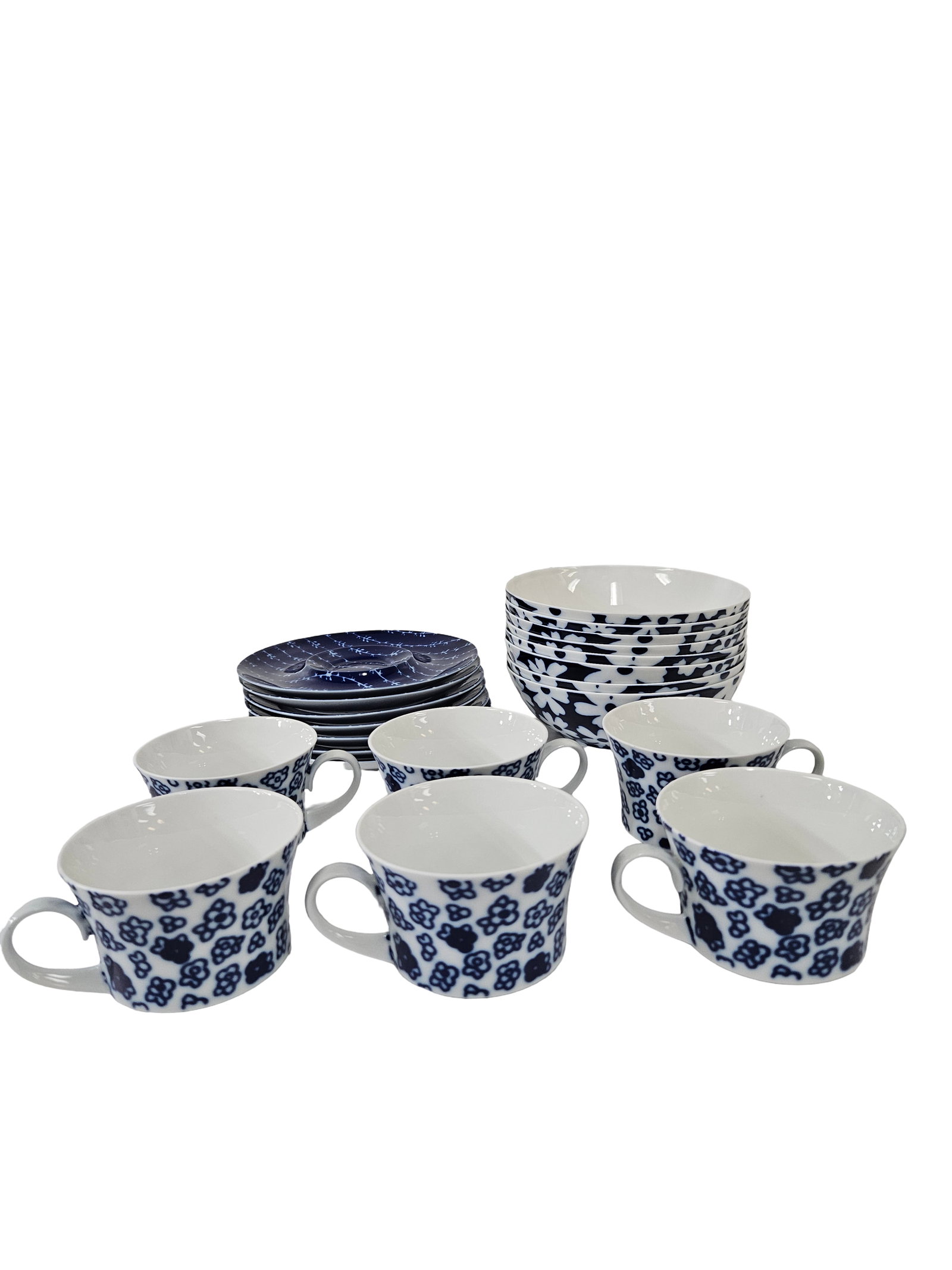 Block Bidasoa Spain Blue Floral Set: This partial dinnerware set from the Variance line by Block Bidasoa features a charming blue and white floral and vine motif. The collection includes six large tea or breakfast cups, eight coordinatin