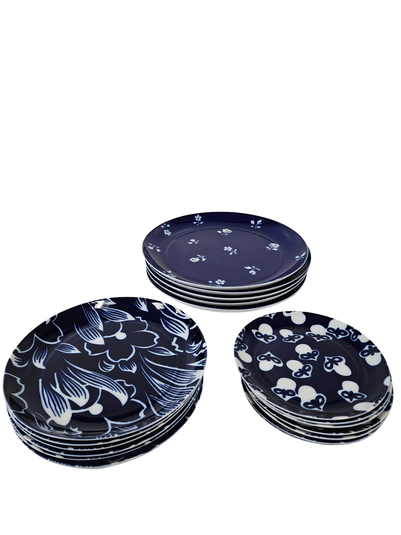 20pc Block Bidasoa Variance Plate Set: This comprehensive 20-piece set from the Block Bidasoa Variance collection features three distinct yet complementary blue and white floral patterns. Crafted in Spain, the collection includes large din