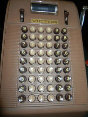 Victor Adding Machine Company made: Victor Adding Machine Company, Made in Chicago Dimensions 7 inches wide by 1 foot long and 4.5 inches tall