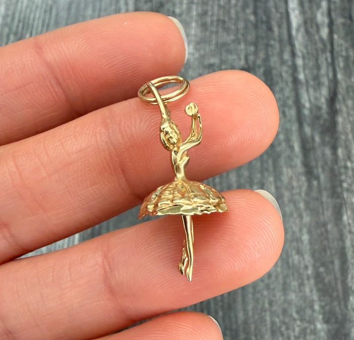 Vintage 14K Gold Dancing Ballerina Charm (S): A whimsical 14K yellow gold charm of a ballerina in a classic dance pose.