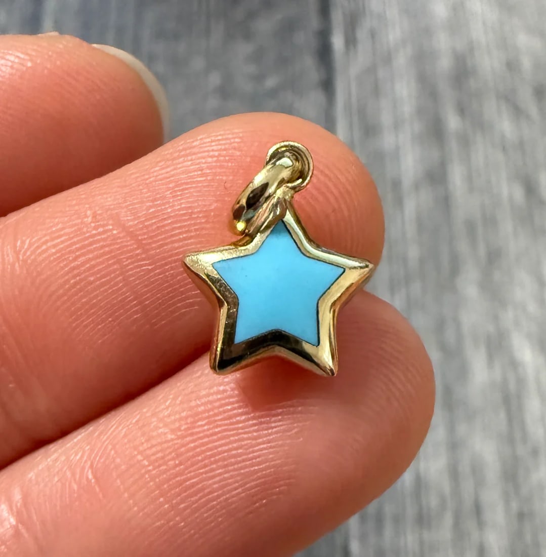 Small Turquoise and 14K Gold Puffy Star Charm: Metal: 14K Yellow Gold Weight: 0.7 gramsMeasurements: 0.4 inches long by 0.4 inches wideMarkings: "14KT ITALY"Condition: In very good condition with only minor surface wear.