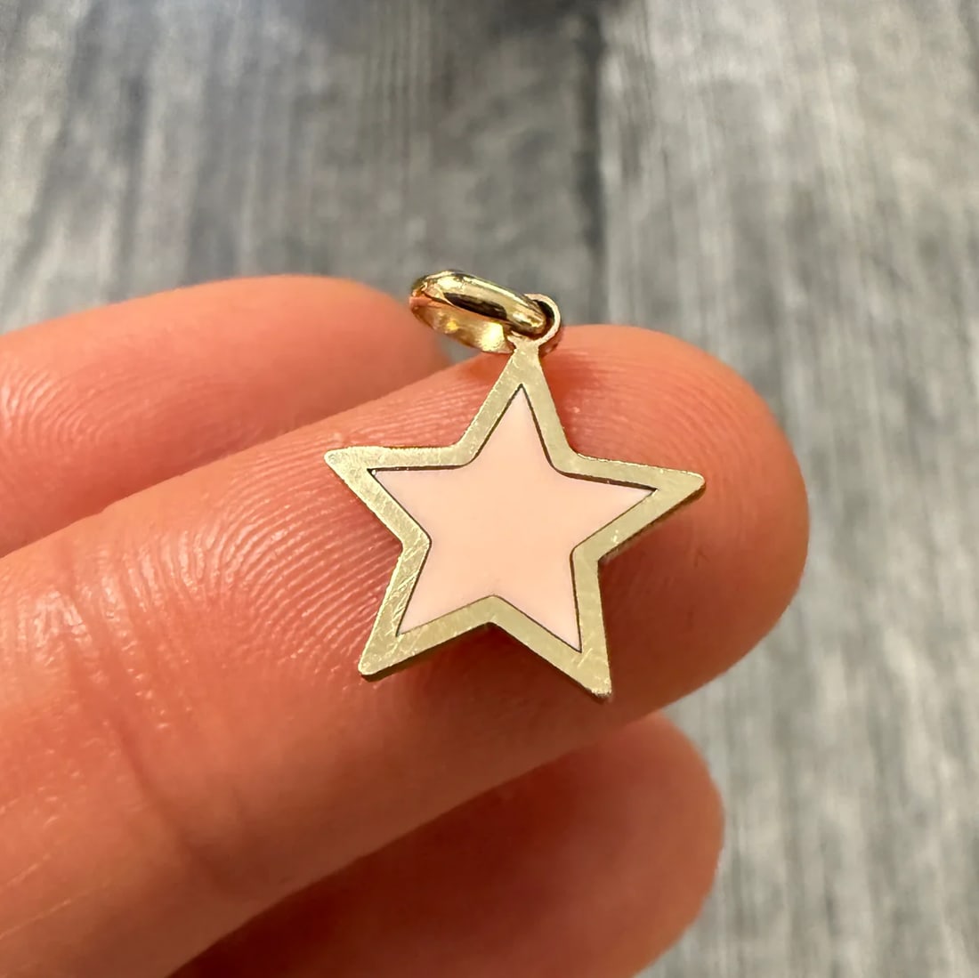 Small Pink Opal and 14K Gold Star Charm: Metal: 14K Yellow Gold Weight: 0.6 gramsMeasurements: 0.5 inches long by 0.5 inches wideMarkings: "14KT ITALY"Condition: In very good condition with only minor surface wear.