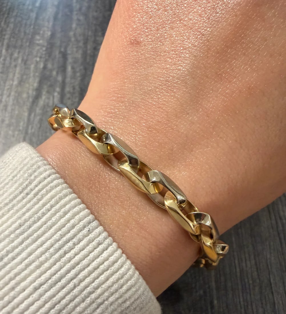 Vintage 14K Bicolor Gold Squared Biker Link Bracelet, 8.25" Long: Metal: 14K Yellow and White Gold Weight: 41.7 gramsMeasurements: 8.25 inches long by 6.8 mm wide (fits like a 7.25" long bracelet due to design)Markings: "14K ITALY"Condition: In very good vintage con