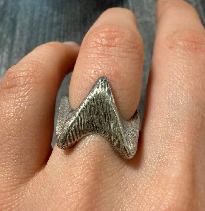 Edgy Modernist Pointed 14K Gold Statement Ring: A unique modernist ring in 14K yellow gold featuring a bold, pointed geometric silhouette.