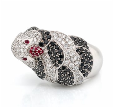 HANS D. KRIEGER 18K White Gold Diamond Pigeon Ring: A designer signed piece by the renowned Hans D. Krieger, featuring a unique "pigeon" motif in 18K white gold with fine diamond pavé.