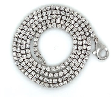 14K White Gold 6.50 Ct. Diamond Tennis Necklace: A sleek 14K white gold tennis necklace featuring 6.50 carats of bright white diamonds.