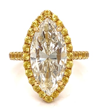 18K Yellow Gold 6.23 Ct. GIA Certified Marquise Diamond Ring: 18K Yellow Gold; GIA Certified 6.23 Ct. Marquise center Diamond.