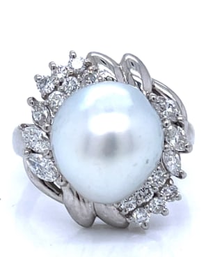 Platinum South Sea Pearl & Diamond Ring: Platinum; South Sea Pearl set with Diamond side stones.