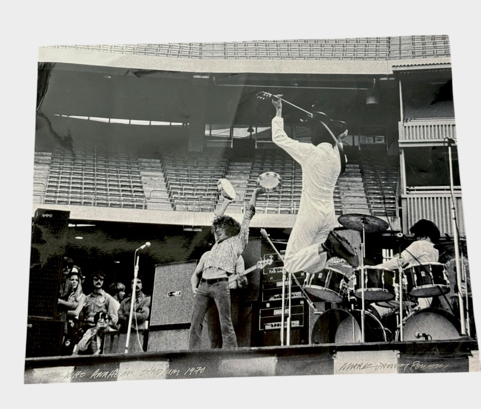 The Who 1970 Concert Photograph Signed by Mark James Powers: Vintage concert photograph signed Mark James Powers A rare and striking black-and-white concert photograph capturing The Who in electrifying performance during their 1970 tour, beautifully signed in i