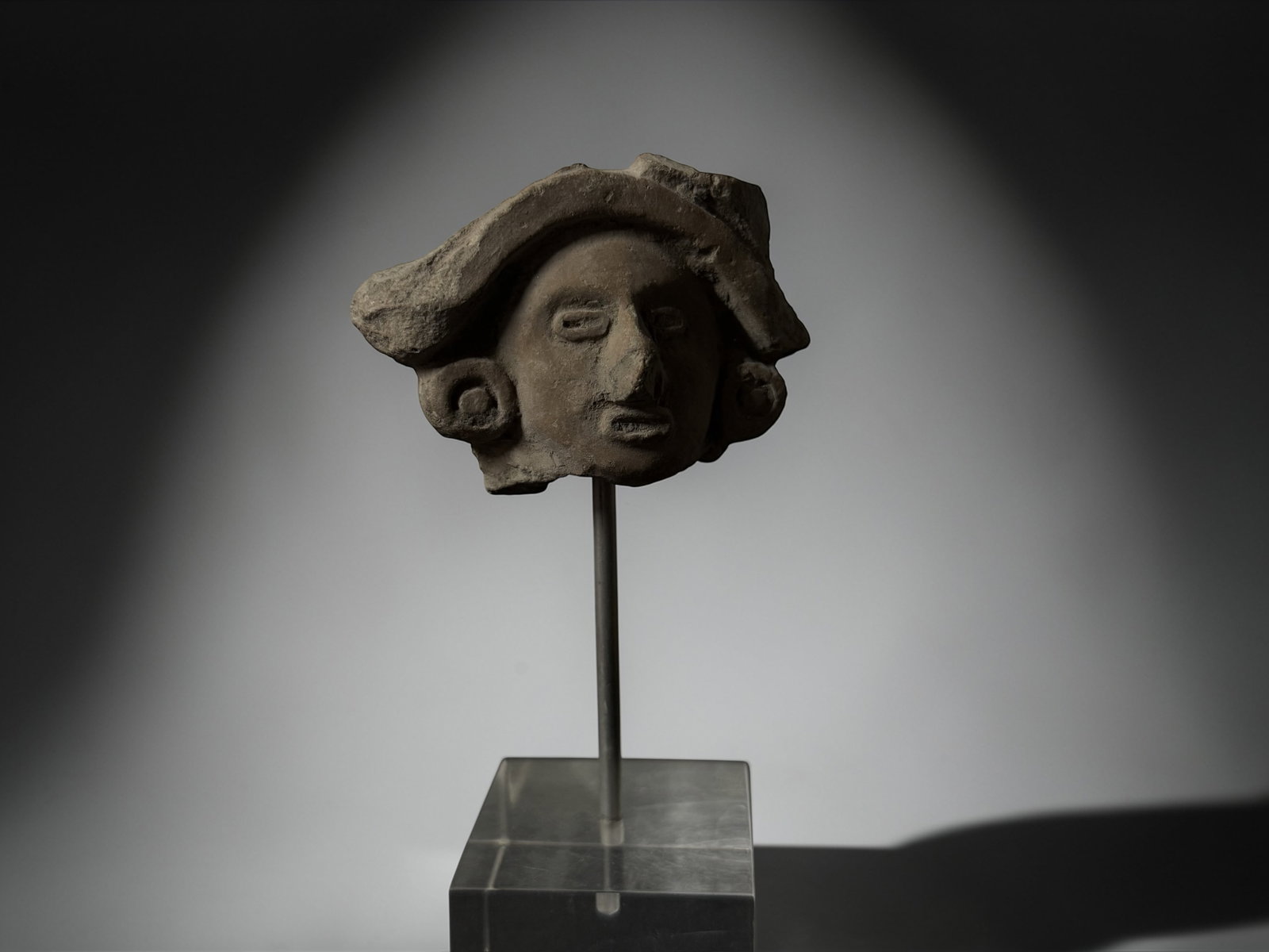 Ancient Terracotta Head Fragment ? Pre-Columbian: This is an authentic ancient artifact created by early cultures using traditional hand-built methods. The surviving form preserves exceptional historical and archaeological value, showing surface