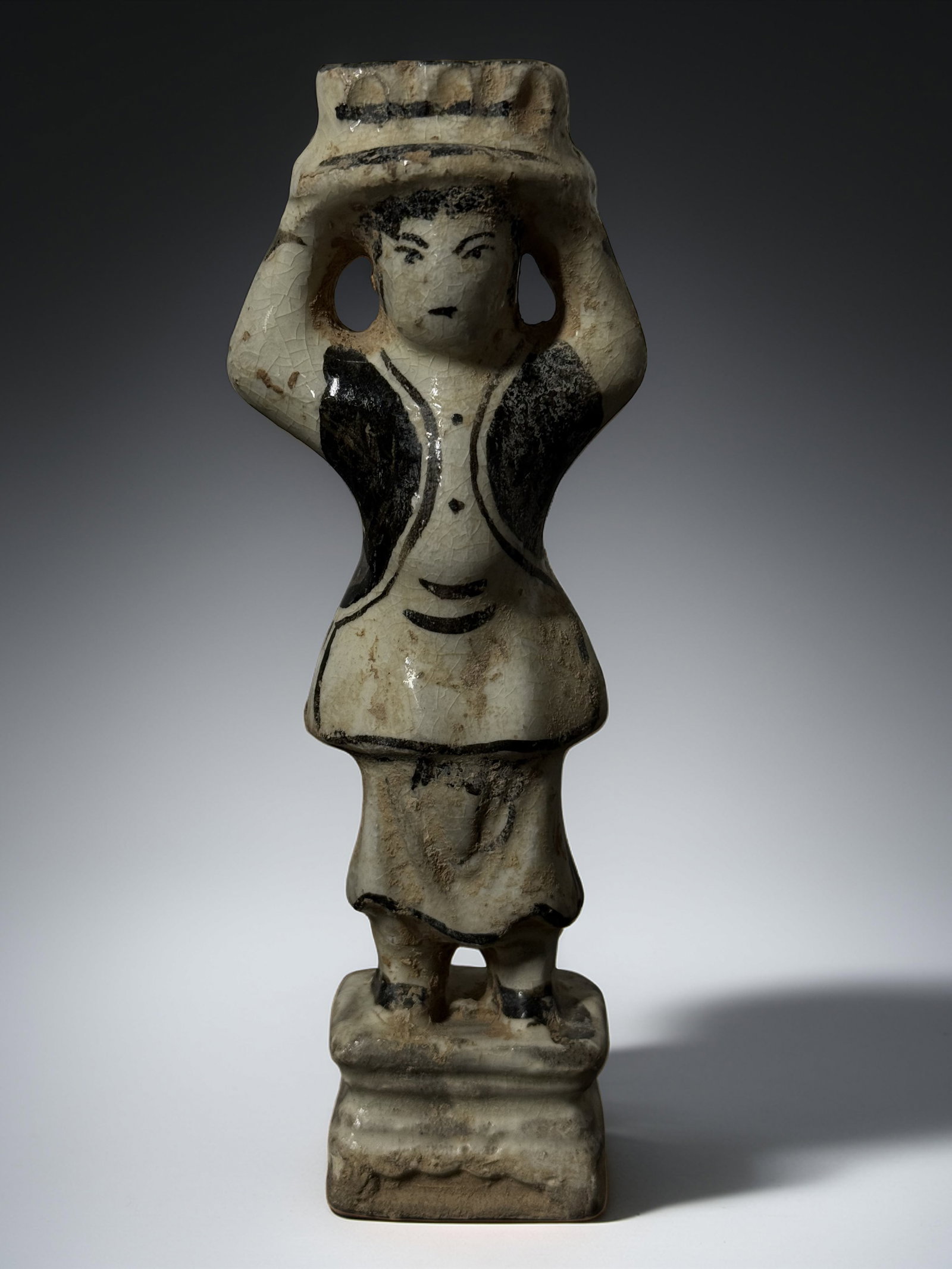 Antique Ceramic Female Figure Black & White Glaze: Antique ceramic standing female figure with black and white glaze decoration. Vintage hand crafted piece featuring expressive facial details and traditional attire. Excellent collectible for ceramic