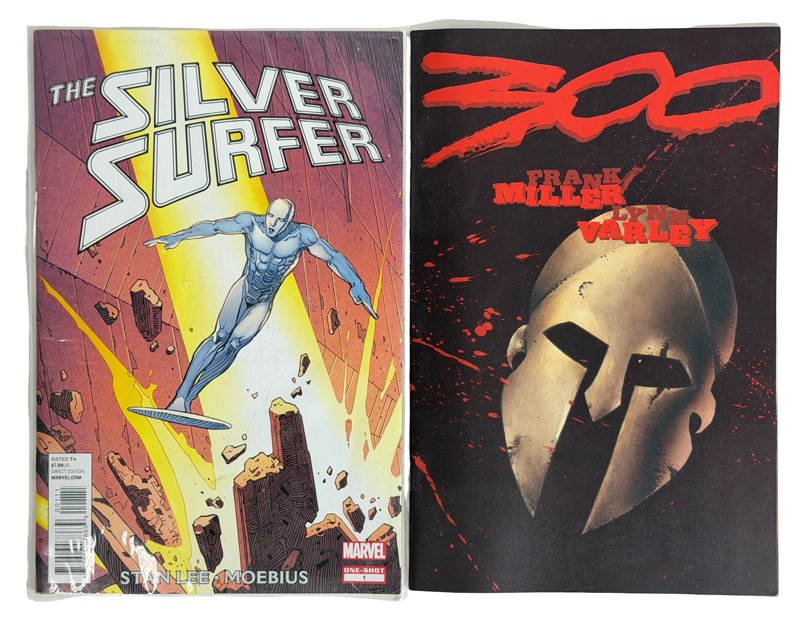 Comic Book Silver Surfer And 300 Graphic Novel Lot: Includes Silver Surfer one-shot and Frank Miller 300 graphic novel. Popular Marvel cosmic hero and iconic graphic novel. Condition very good. Keywords: Silver Surfer, Frank Miller 300, Marvel comics,