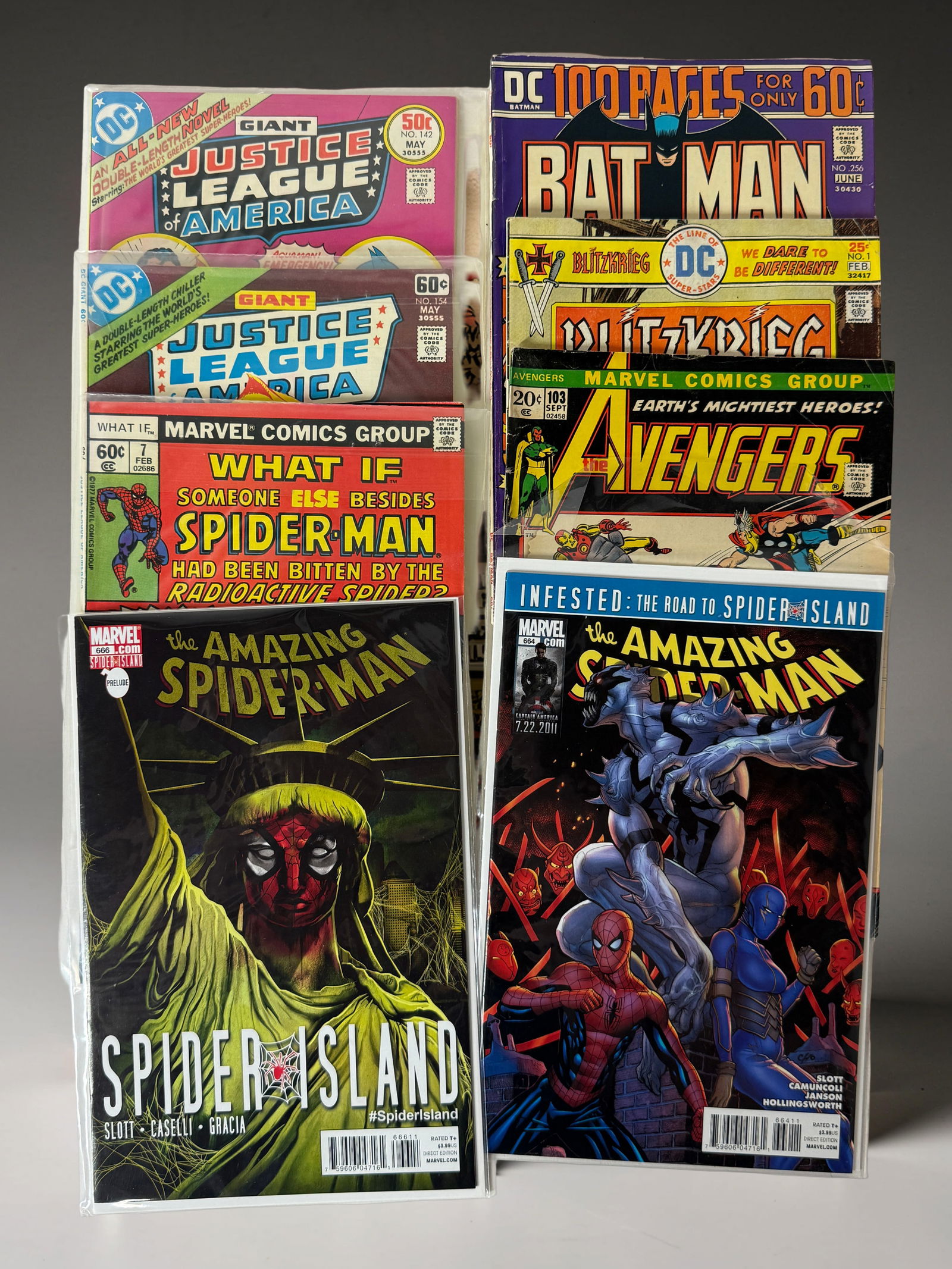 Mixed Comic Book Lot (Justice League, Batman, Avengers): Assorted vintage and modern comics including Justice League, Batman, Avengers, and Spider-Man titles.