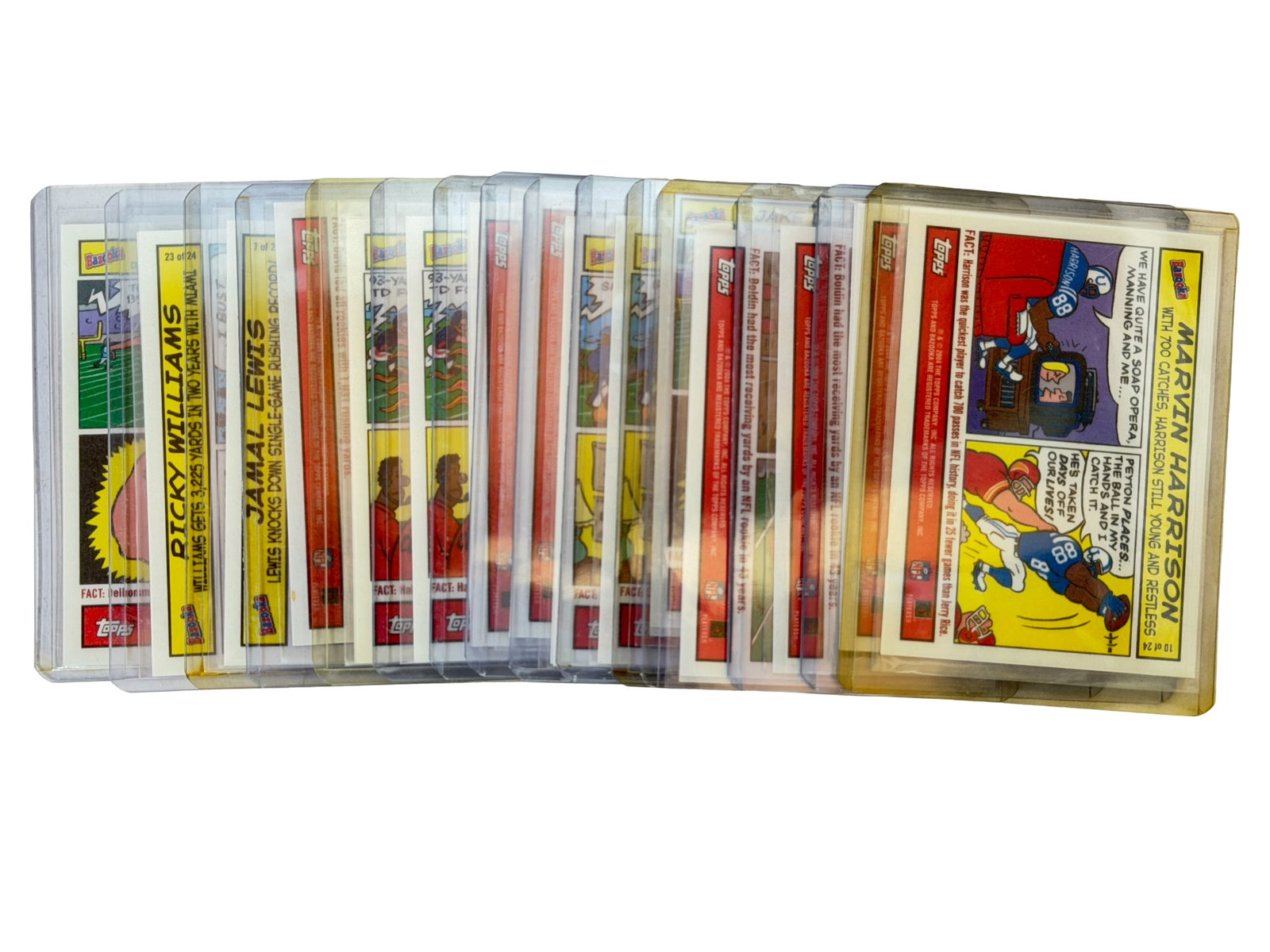 Topps Trading Football Card Lot (Toploaders): Collection of vintage-style Topps/Bazooka cartoon football cards featuring players like Marvin Harrison, Randy Moss, Michael Vick and others. Stored in protective top loaders.