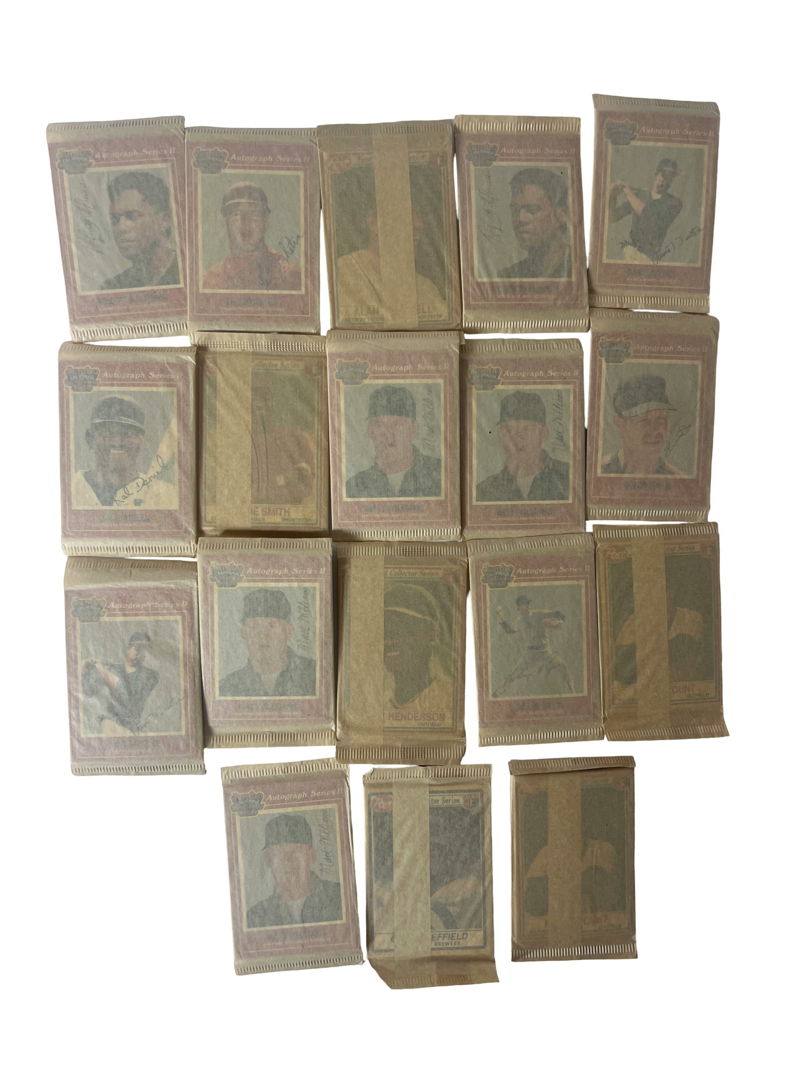 Group Lot of Sealed Autograph Series II Baseball Card Packs: Collection of approximately 18 unopened wax packs of vintage-style baseball trading cards labeled ?Autograph Series II.? Packs feature printed player portraits and facsimile autograph designs on the w