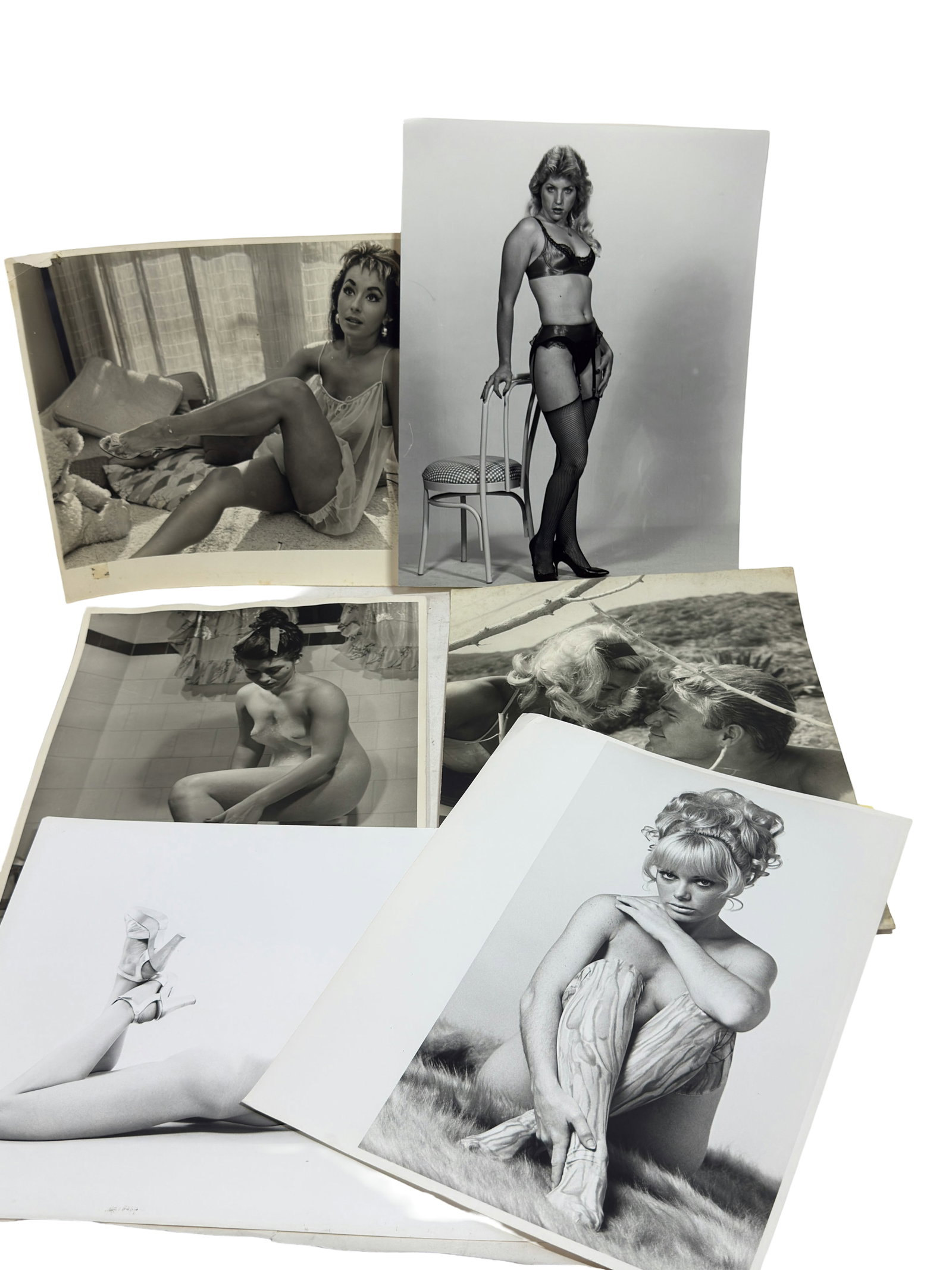 Vintage Glamour & Pin-Up Photographs (Approx. 6 pcs): Group of vintage black-and-white glamour and pin-up photographs, various subjects and sizes.