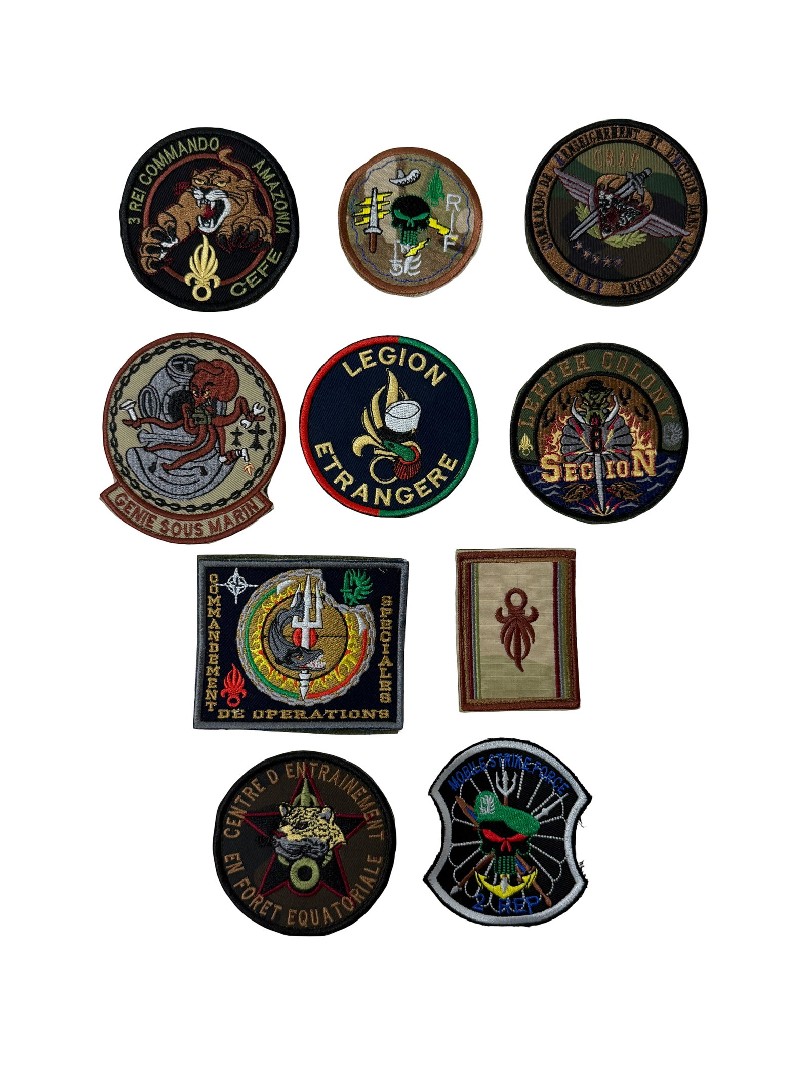 Collection of Military Embroidered Patches: Mixed lot of embroidered military and foreign legion patches, including French Foreign Legion commando units, special forces insignia, training centers, and marine units. Features various designs such