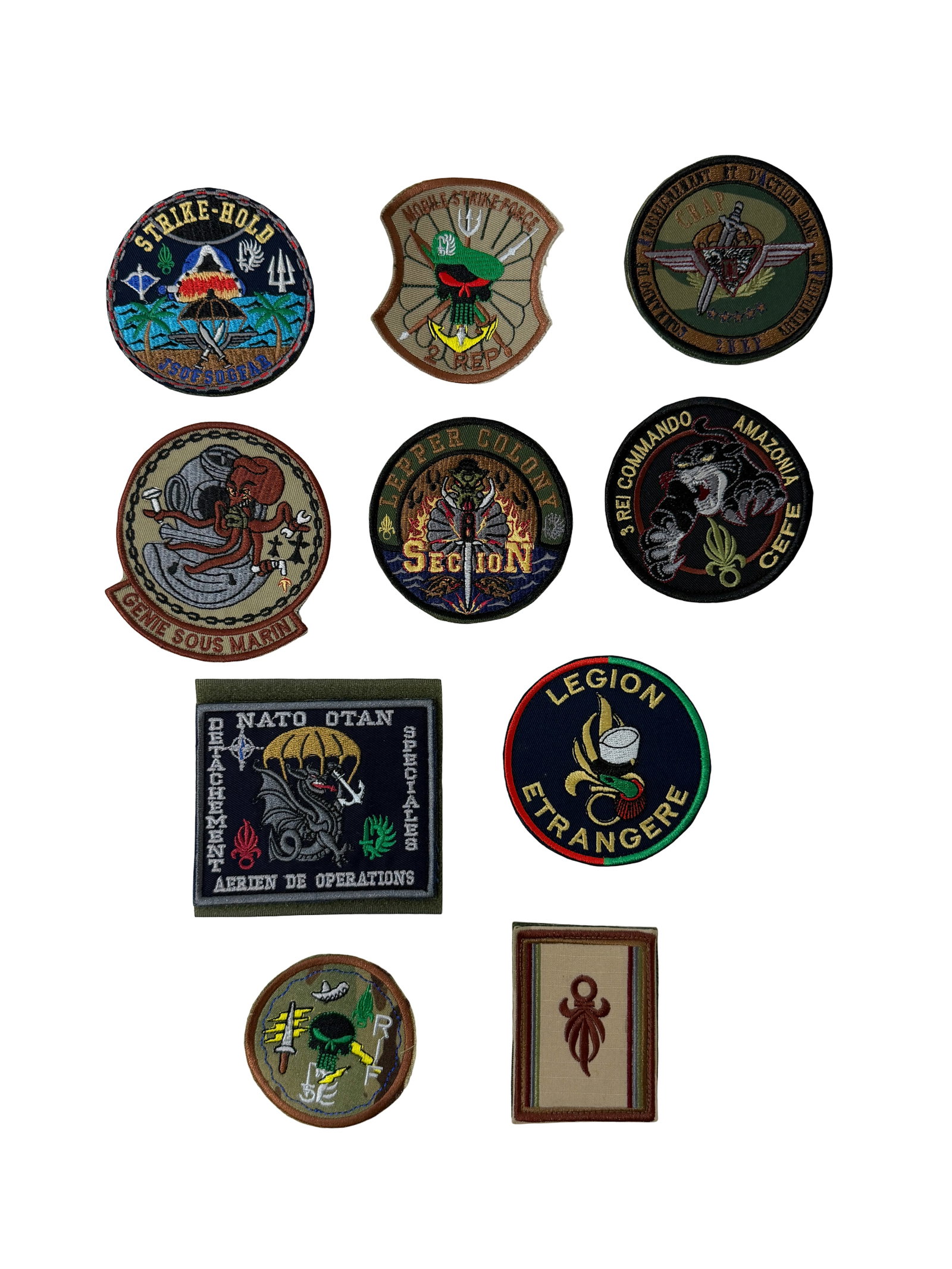 Collection of Military Embroidered Patches: Mixed lot of embroidered military and foreign legion patches, including French Foreign Legion commando units, special forces insignia, training centers, and marine units. Features various designs such