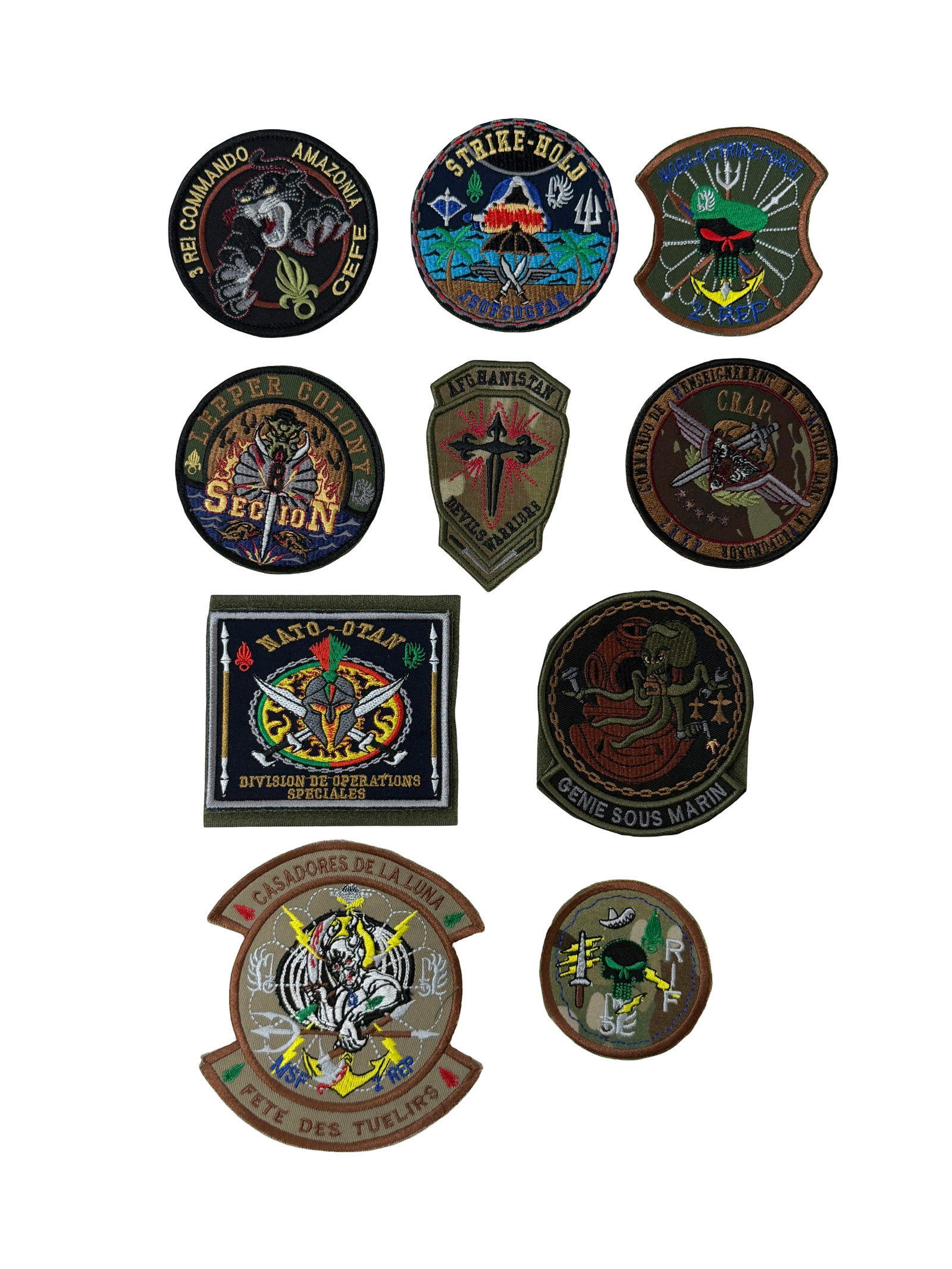 Collection of Military Embroidered Patches: Mixed lot of embroidered military and foreign legion patches, including French Foreign Legion commando units, special forces insignia, training centers, and marine units. Features various designs such