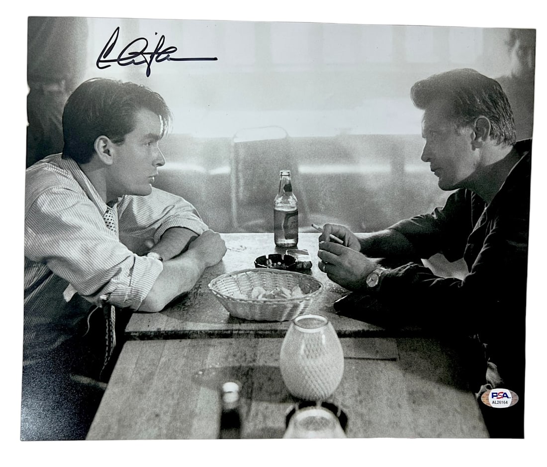 Signed CHARLIE SHEEN Autograph Auto 11x14 Black-and-White Movie Photograph PSA: Autographed black-and-white photograph featuring two actors seated at a diner table. PSA authenticated.