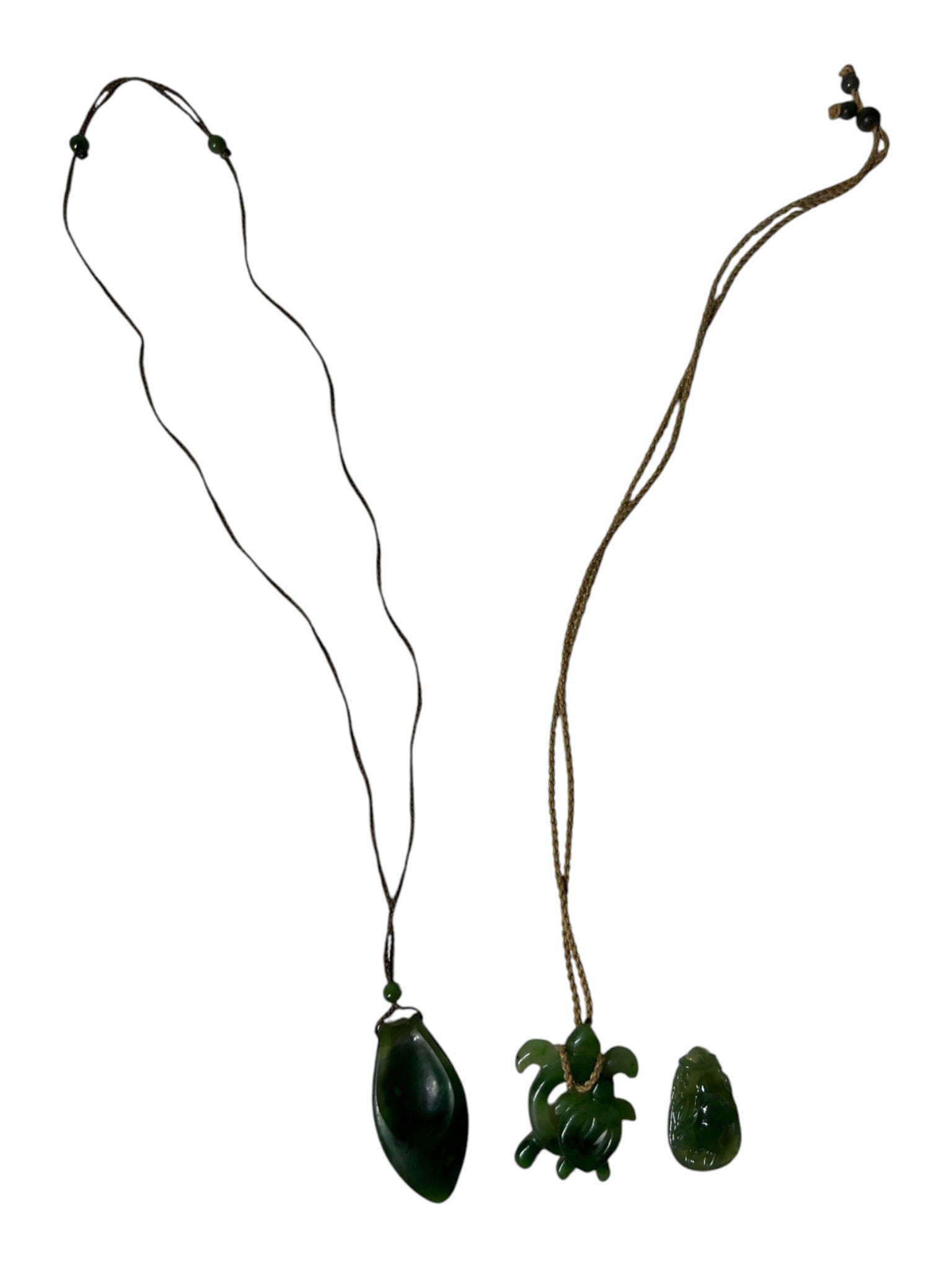 Jade Style Pendant Group: Group of green hardstone pendants including turtle and carved figural examples.