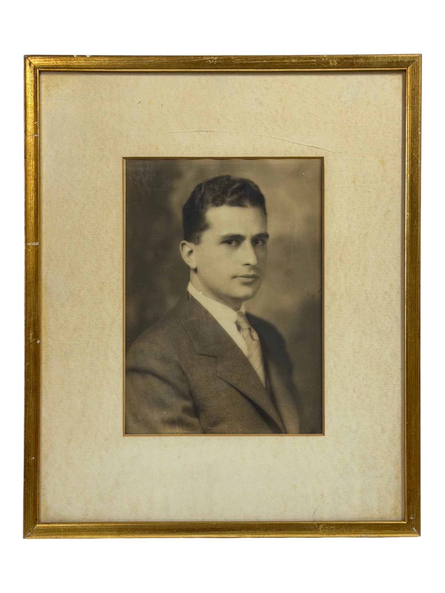 Vintage Portrait Photograph: Framed vintage sepia-toned portrait photograph of a gentleman.