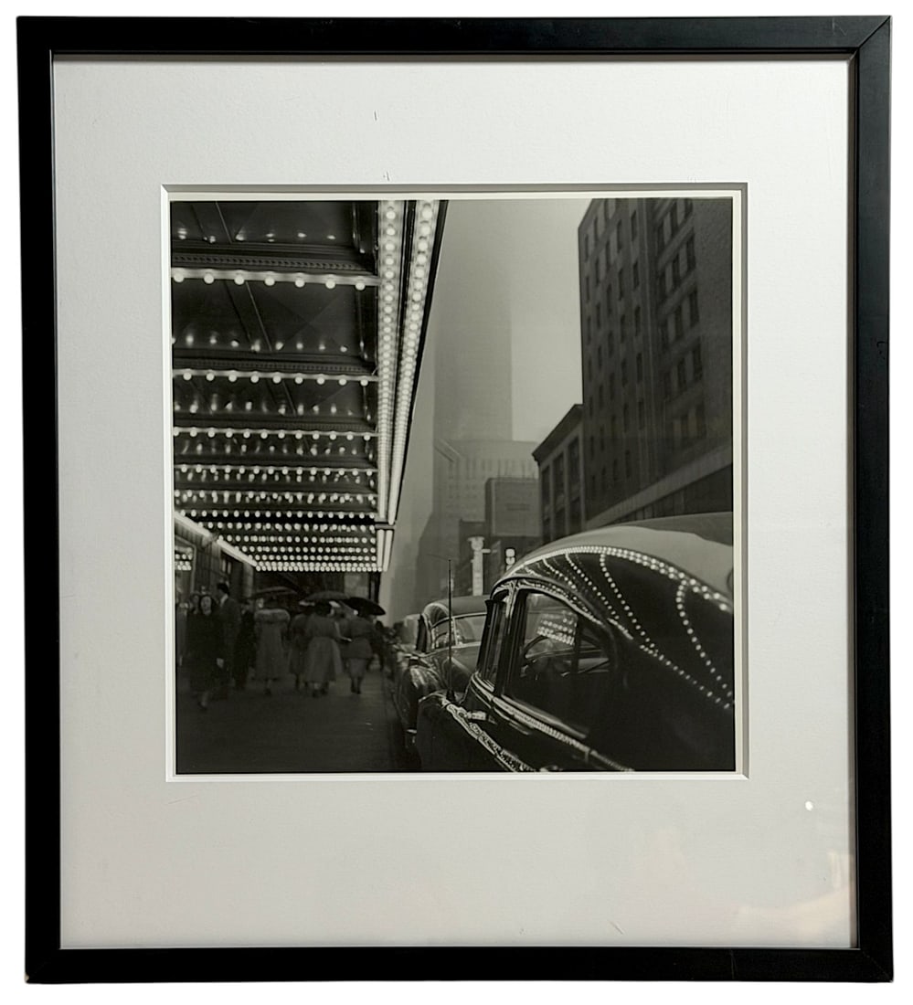 ERNST HAAS (1921?1986) New York City, Manhattan, early 1950s Black and White Photograph: Framed black and white urban photograph with theater marquee and classic automobiles.