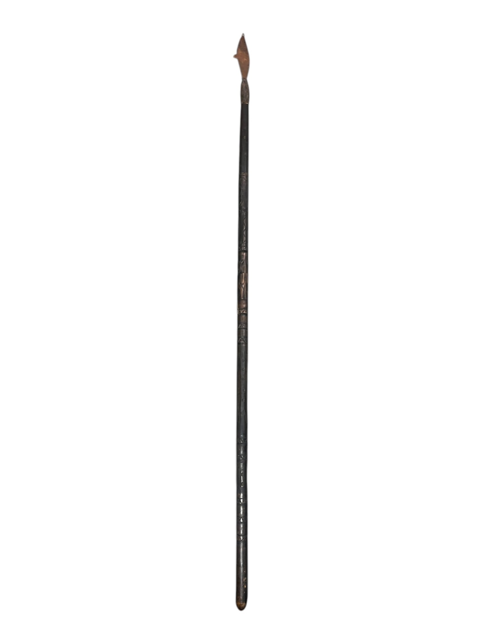 Antique Harpoon or Spear Head: Iron harpoon or spear head mounted on shaft, showing age and oxidation.