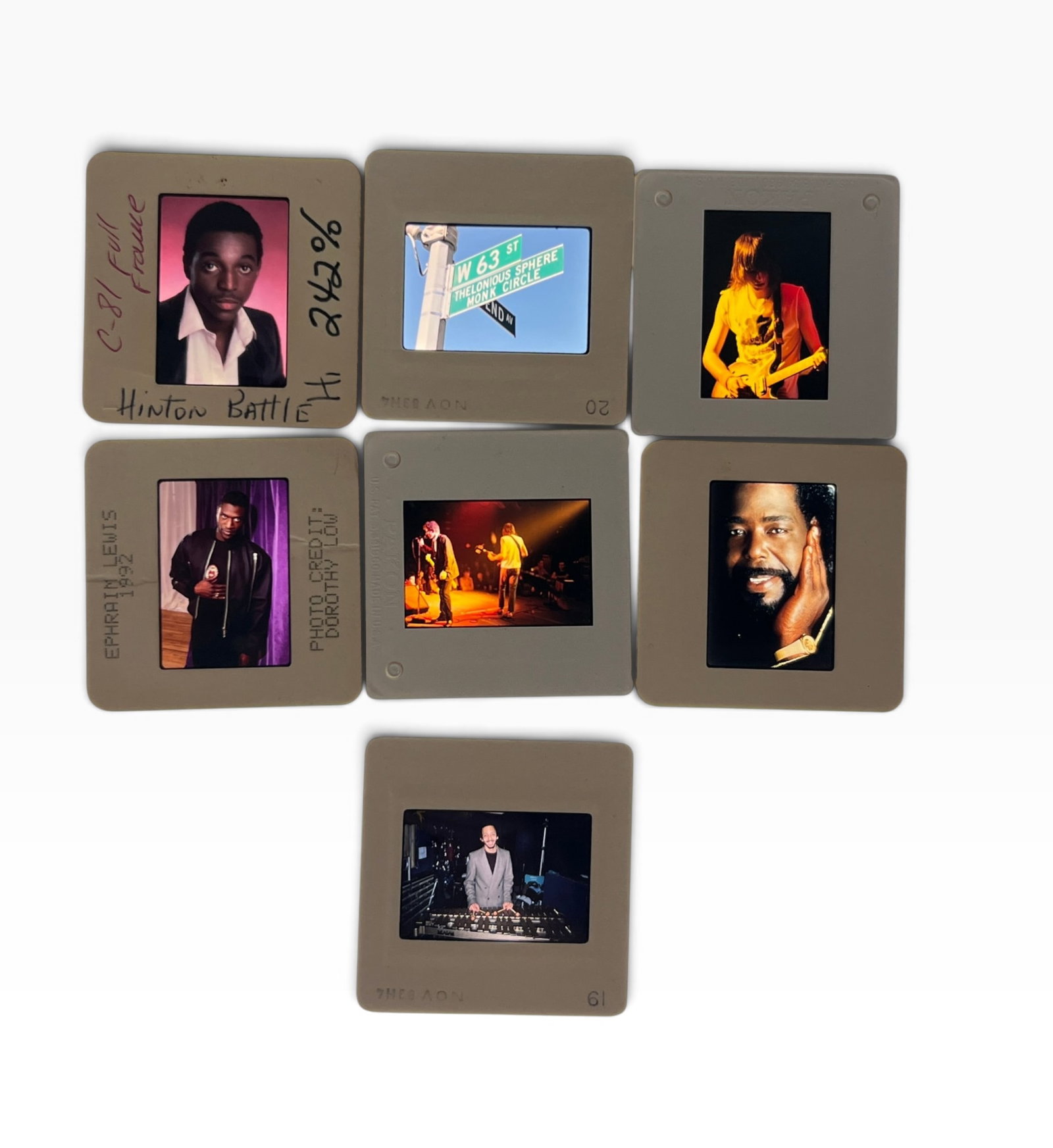 Vintage Music Production Promotional Color Slides Hinton Battle Performers 7 Pc: Group of seven mounted color transparency slides with music-industry and performance images. One slide is handwritten 'Hinton Battle' with production notation; another is marked 'Ephraim Lewis 1992.' 