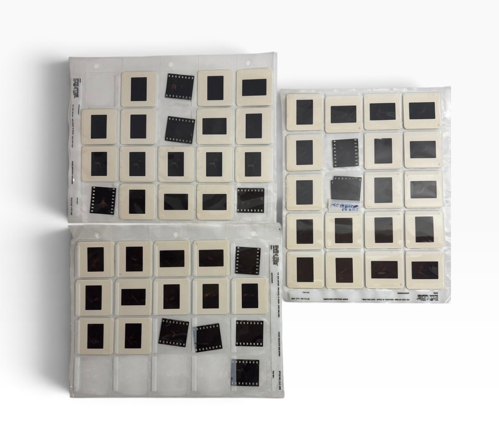 Vintage Adult Color Slides Film Transparencies Large Group: Large assortment of vintage mounted color slides and loose film transparencies shown on a light table. Includes numerous studio glamour images and multiple formats. Untested and sold as an archive lot