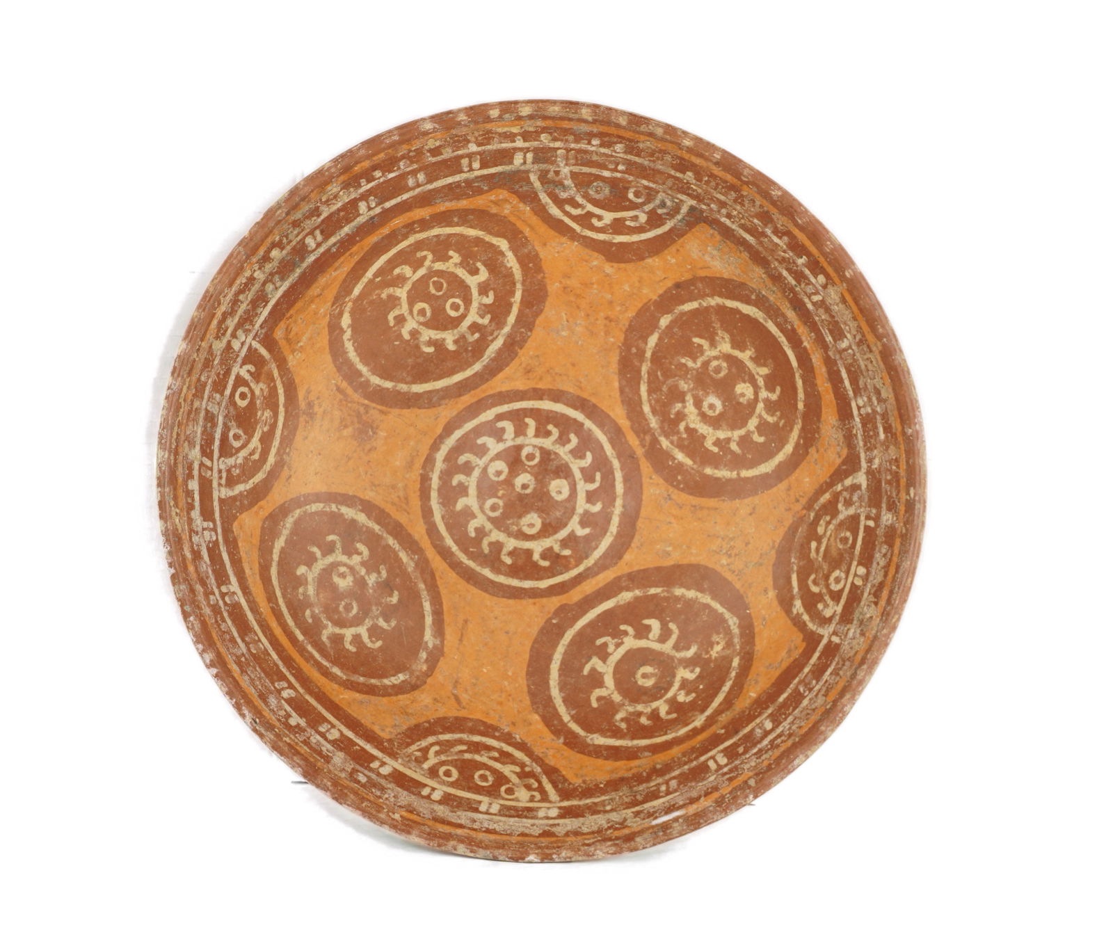 Pre Columbian Mayan Plate: This is a pre Columbian Mayan plate, probably from Central America and features a sun motif. It has a few chips which can be seen in the photos and an un repaired crack that doesn’t cause any