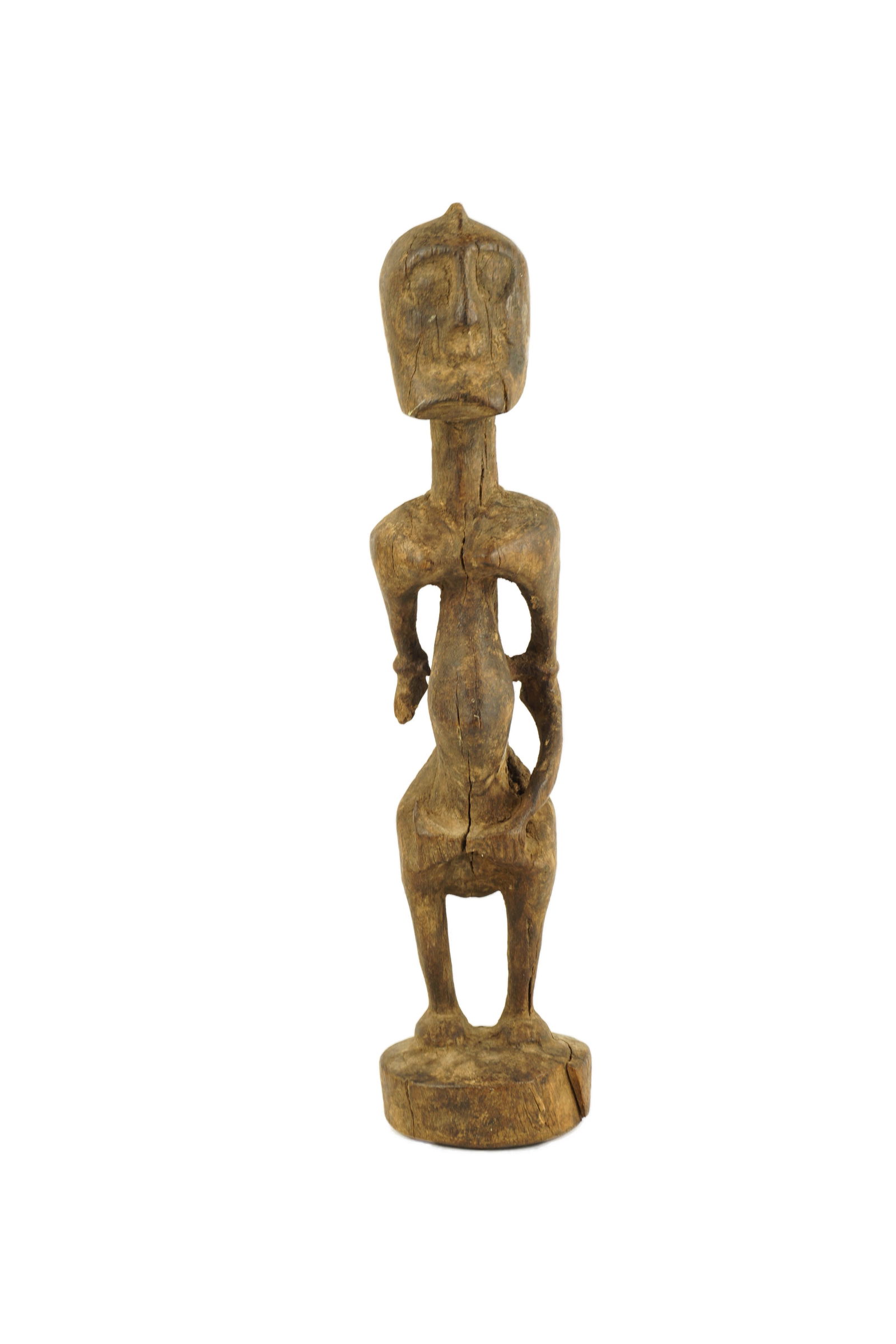 Dogon Figure: Late 19th to Early 20th Century. An amazing loved, tribal used and appreciated female figure from the Dogon people of Mali. Missing a forearm. Patina has been tested. Provenance is from a dealer in