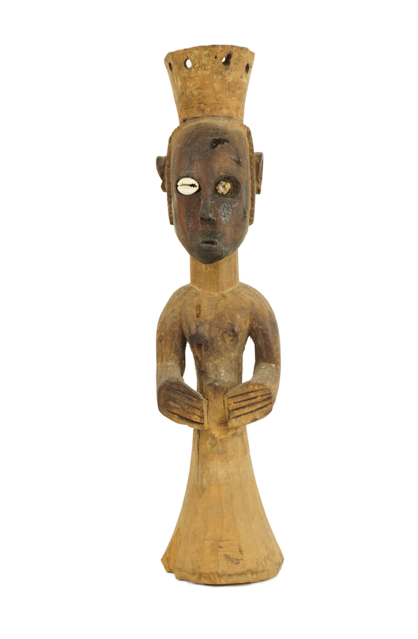 Congolese Figure: A late, probably mid century, Congolese figure. It seems to be an honest piece with some evidence of libations and tribal use for a relatively short time. It is missing a cowrie shell eye, but