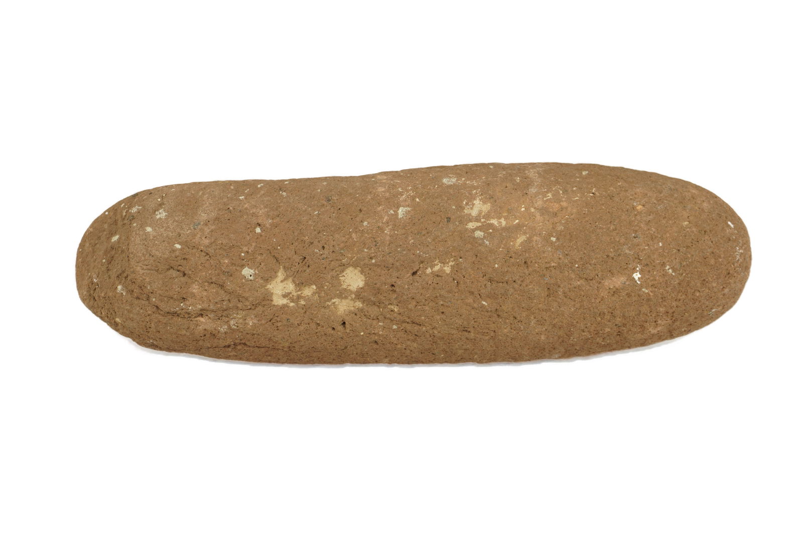 Large Cylindrical Stone Pestle: A large, elongated grinding tool or pestle fashioned from a dense, reddish-brown stone. The piece is roughly cylindrical with tapered, rounded ends, exhibiting a uniform surface texture achieved