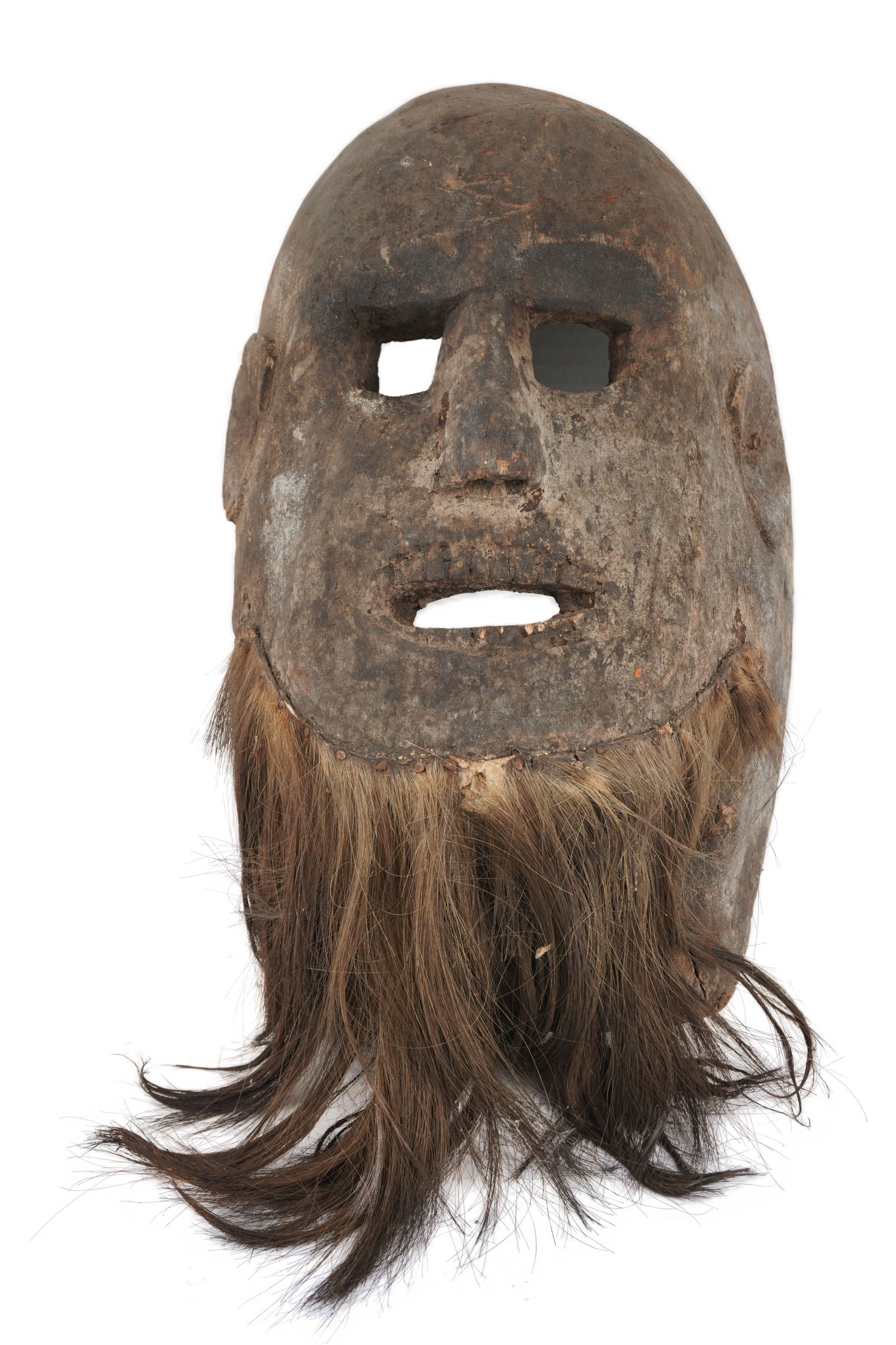 East African Mask: Early to Mid 20th Century. An East African, possibly Tanzanian, mask made out of light wood and adorned with animal hair, possibly monkey. Provenance of a dealer in San Francisco. We guarantee every