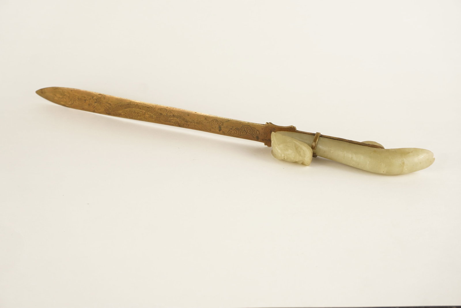 Chinese Bronze Letter Opener with Carved Celadon Jade Dragon Hook Handle: SHIPPING NOTE: We have in house shipping and can do fairly cheap rates, and I am more than happy to combine shipping. I can often do better than the Live Auctioneers shipping quote, so bid away! Feel 